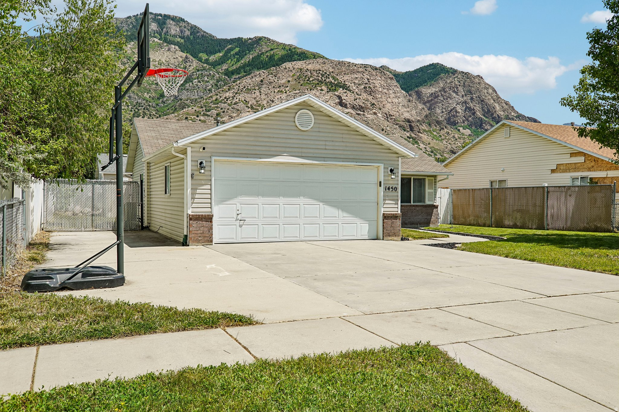 !!! PRICE REDUCED !!! There's something about coming home to mountain views that never gets old - and at 1450 N Madison, you'll get them every single day. This one-level North Ogden charmer has been thoughtfully updated where it counts: a brand-new 2025 heat pump AC & new furnace mean you'll stay cozy all year around, the 2021 water softener keeps things running clean, and the refreshed bathroom adds a touch of polish you'll appreciate every morning. Soaring vaulted ceilings give the home an open, airy feel, while the 2-car garage, RV parking, and storage shed mean there's room for all your gear. All of this at $375,000! World-class skiing, trails, and canyon adventures are just minutes away. Homes like this don't sit long