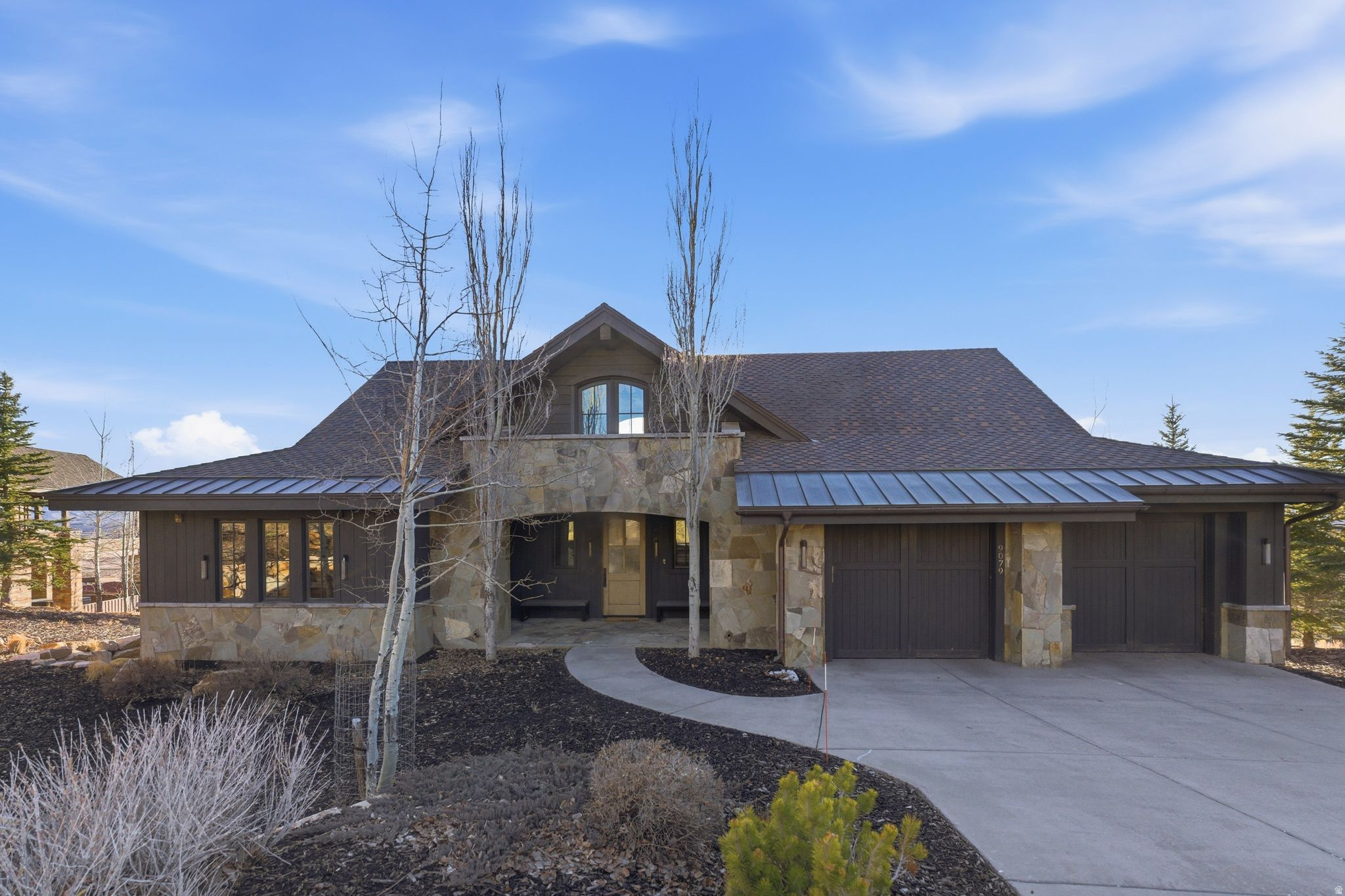 Framed by spectacular panoramic views of Park City Mountain and Deer Valley, this beautifully remodeled Dixon floor plan captures the essence of the Park City lifestyle. Vaulted ceilings, expansive windows, and an open great room create a warm gathering space after a day on the slopes, while expansive decks and a private hot tub take full advantage of the breathtaking alpine setting. Nightly rentals are allowed, offering exceptional flexibility for both personal enjoyment and investment potential. Remodeled in 2019, the home spans 4,318 square feet with four ensuite bedrooms and six bathrooms, thoughtfully designed to host family and guests in comfort. The open-concept living spaces are ideal for entertaining, while the home's orientation captures incredible mountain and valley views from nearly every angle. Ideally located less than five minutes from the Promontory gate and approximately 45 minutes from Salt Lake City International Airport, the home offers convenient access to Historic Park City, world-class skiing, golf, dining, and year-round recreation. Owners have the option to join Promontory Club, which features two private on-mountain ski lodges at Deer Valley and Park City Mountain, making ski days seamless with convenient gear storage and direct mountain access. Call Kourtney or Richard for more information!  All information herein is deemed reliable but is not guaranteed. Buyer is responsible to verify all listing information, including square feet/acreage, to buyer's own satisfaction.