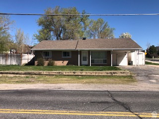 Nice location with lots of natural light.  View of mountains.  Large front room, large family room,. 4 bedrooms and 2 baths.  Detached 2 car garage is deep with lots of space.    Square footage figures are provided as a courtesy estimate only . Buyer is advised to obtain an independent measurement.