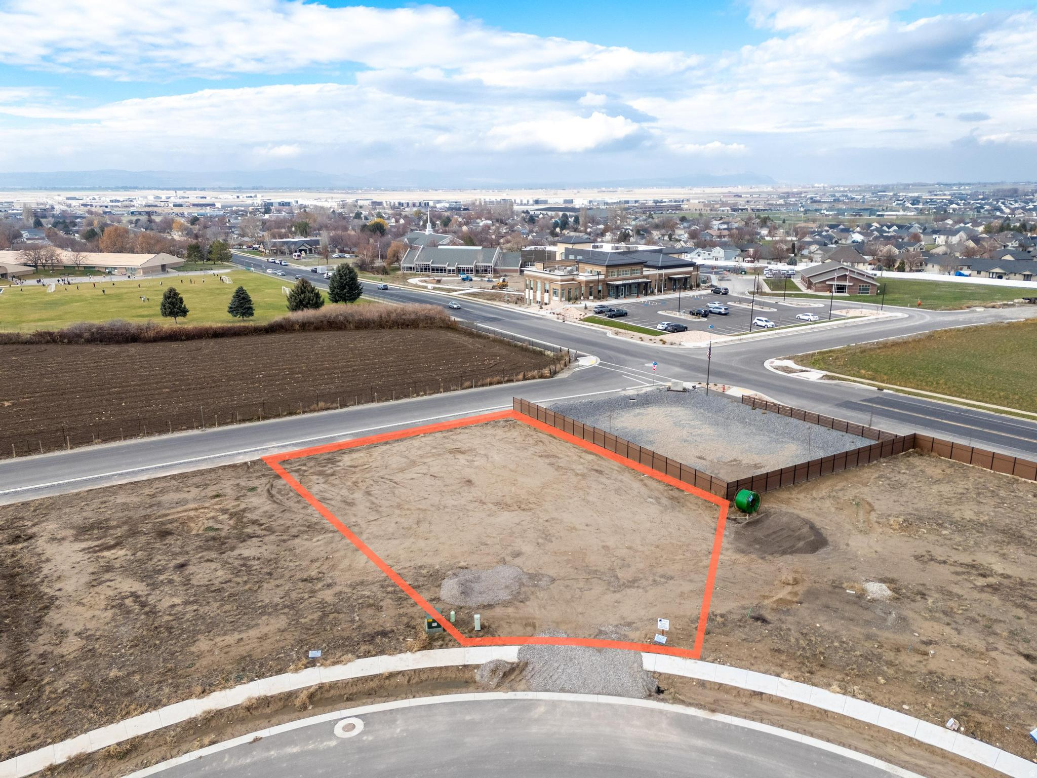 Lot # 4  Smiling H Subdivision is an inviting community located in charming North Logan, Utah. This beautifully designed neighborhood offers a variety of amenities and features that cater to any lifestyle. Residents can enjoy the nearby recreational activities, include pickle ball courts, a splash pad for fun on warm days, and even an ice rink for winter sports enthusiasts. A public library and a police department nearby enhance the community's convenience and security. Families will appreciate the close proximity to schools, making it easy for children to access quality education. Additionally, every building lot is equipped with secondary water connections which is a big saver for the overall water bill. The availability of high-speed fiber internet provides residents with excellent connectivity for work and leisure. The fiber internet bill is part of the low monthly HOA fee of $65. Overall, Smiling H Subdivision offers a harmonious blend of nearby recreational opportunities and essential services, making it an ideal place to call home.