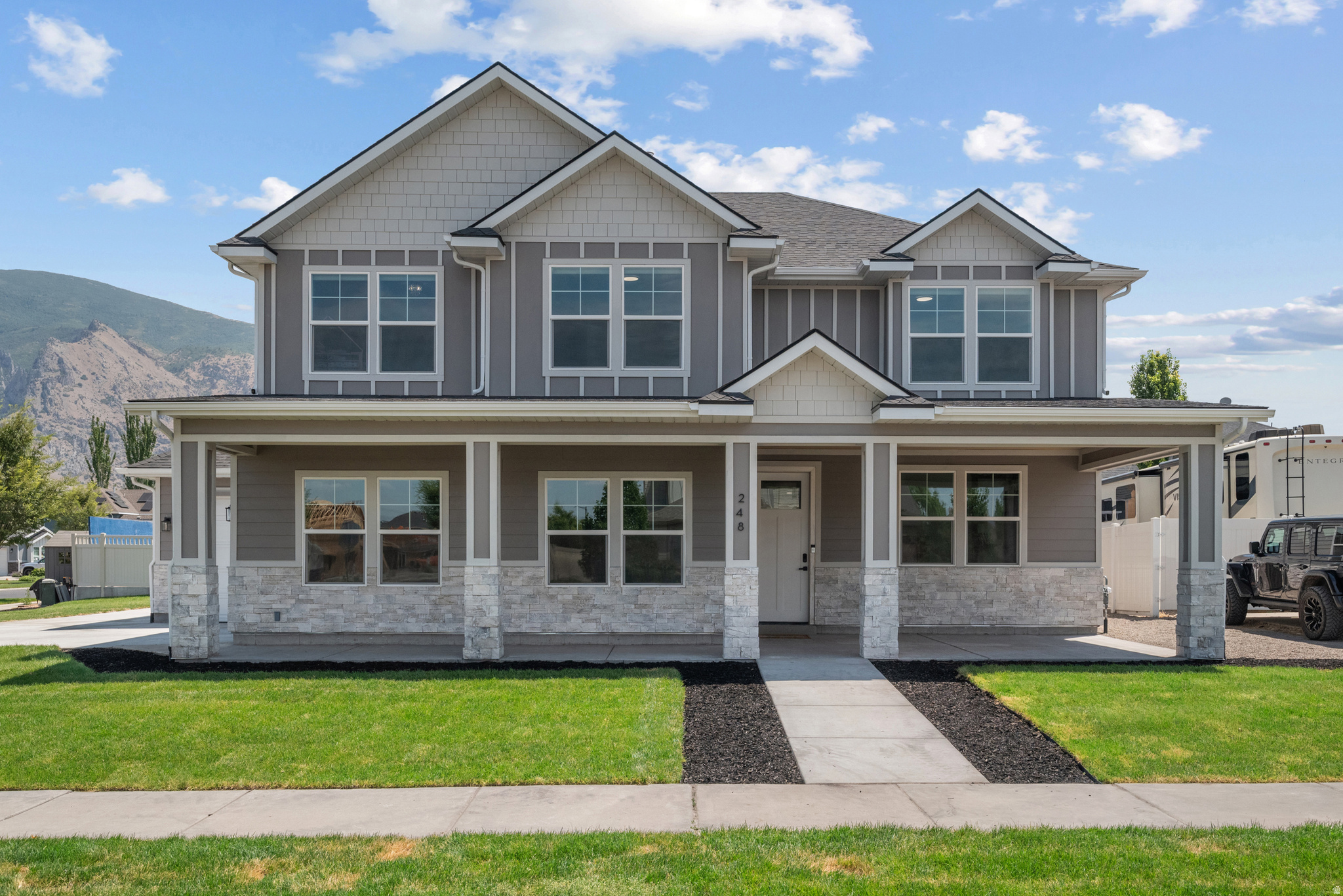 Stunning 2026 Home with Mountain Views! Welcome to 248 N 750 W, Springville, UT. Built in 2026, this beautiful 4-bed, 3-bath home offers over 3,000 sq. ft. of modern, open-concept living space. Here's why you'll love this home. Premium Finishes: 9 ft. ceilings, premium LVP flooring, and a gourmet kitchen with quartz countertops and custom oak cabinets stacked to the ceiling. Smart Layout: Features large bedrooms, a main-floor office, a spacious loft, elegant built-ins, and a master bath with a freestanding tub. Outdoor Living: Great curb appeal with a stone and siding exterior, a large front porch, a covered back patio, and full landscaping. Location: Desirable neighborhood within walking distance to Westside Elementary School and just minutes from local shopping and dining! Quick access to I-15 makes commuting effortless. All appliances and systems are new! Even though the county shows the year built as 2025, the Certificate of Occupancy wasn't issued until 2026. This is pretty much a brand new home.