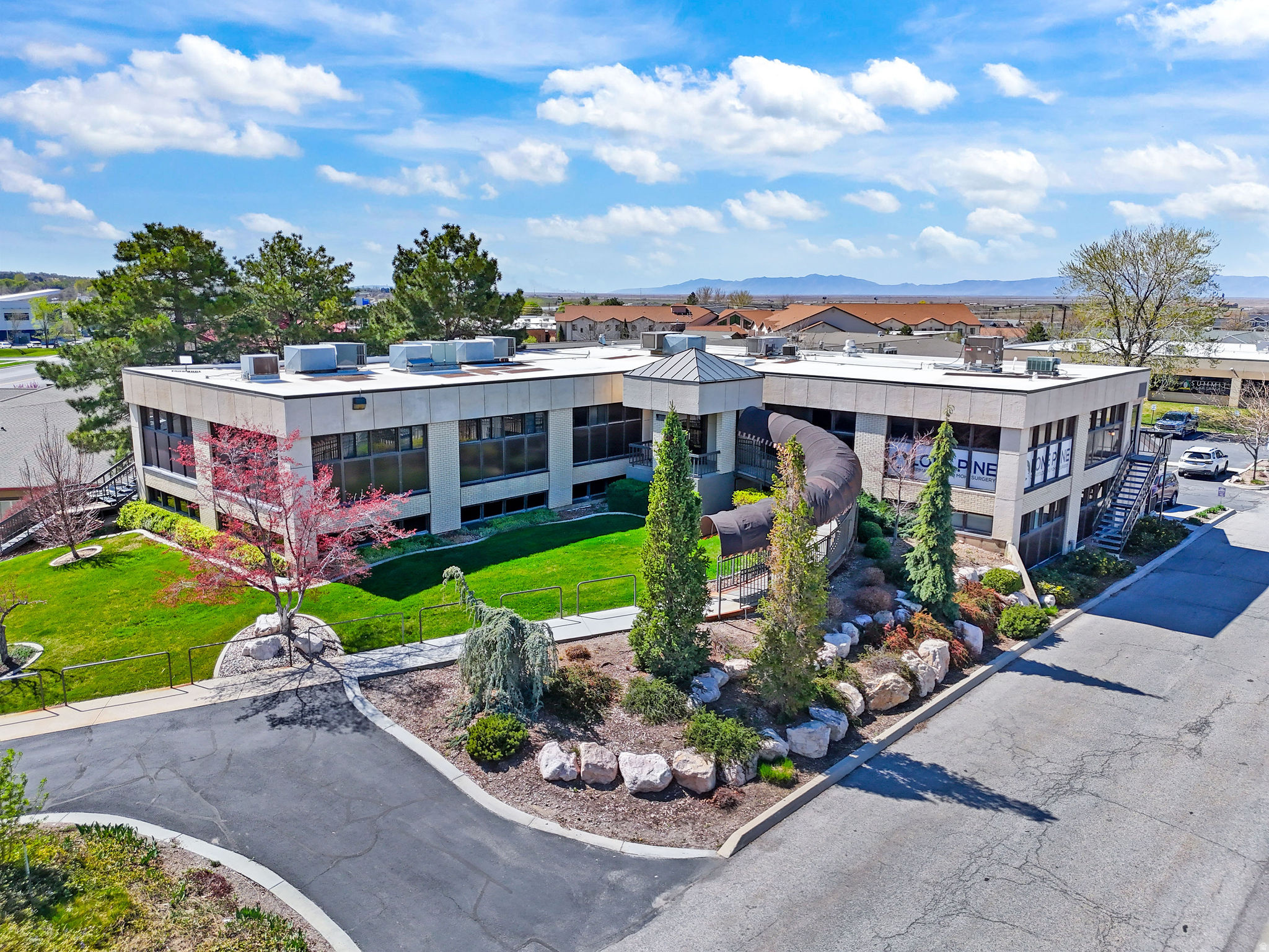 Opportunity knocks with this ideally located commercial office condo just steps from Brigham City Community Hospital and close to major roads and highways. With 888 square feet of functional space and excellent traffic exposure, this property is perfectly positioned for medical, professional, or small business use.  While the space could use a little TLC, the potential is undeniable. Whether you're looking to create your own office, investment property, or business headquarters, this is a rare chance to own commercial space in a highly visible and convenient location. Great accessibility, strong surrounding businesses, and a sought-after area make this one worth a look! All information given deemed reliable, Buyer and Buyer Agent to verify all.