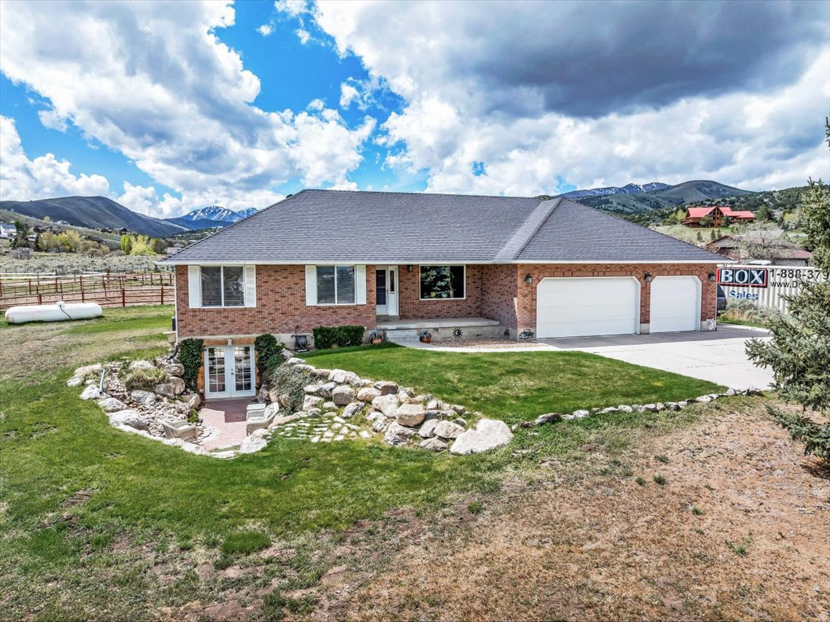 Live the kind of lifestyle that gives you space to breathe, roam, and explore-set on 2.8 acres in desirable Hi Country Estates near Rose Canyon, just minutes from Yellow Fork Canyon's scenic trail system for hiking, horseback riding, biking, and snowshoeing. This fully fenced horse property is thoughtfully set up for both everyday living and long-term flexibility. The walk-out basement offers excellent potential for a future ADU-ideal for multi-generational living or added income. Equestrian amenities are already in place with two barns and a shed. The 36x36 barn includes an arena, three stalls, tack room, and generous hay storage, while the 36x24 barn adds four more stalls and additional storage. Each stall is equipped with its own water source, making care simple and efficient. Recent updates provide peace of mind, including a newer furnace and AC (2021), paid-off solar, and 30-year shingles installed in 2017. The home also features a whole house humidifier, water softener (2026), and an included garage air compressor with built-in hose access-perfect for tools, toys, and keeping everything ready to go. Whether you're bringing horses, hobbies, or simply craving open space and connection to the outdoors, this property offers a rare opportunity to create the lifestyle you've been looking for.