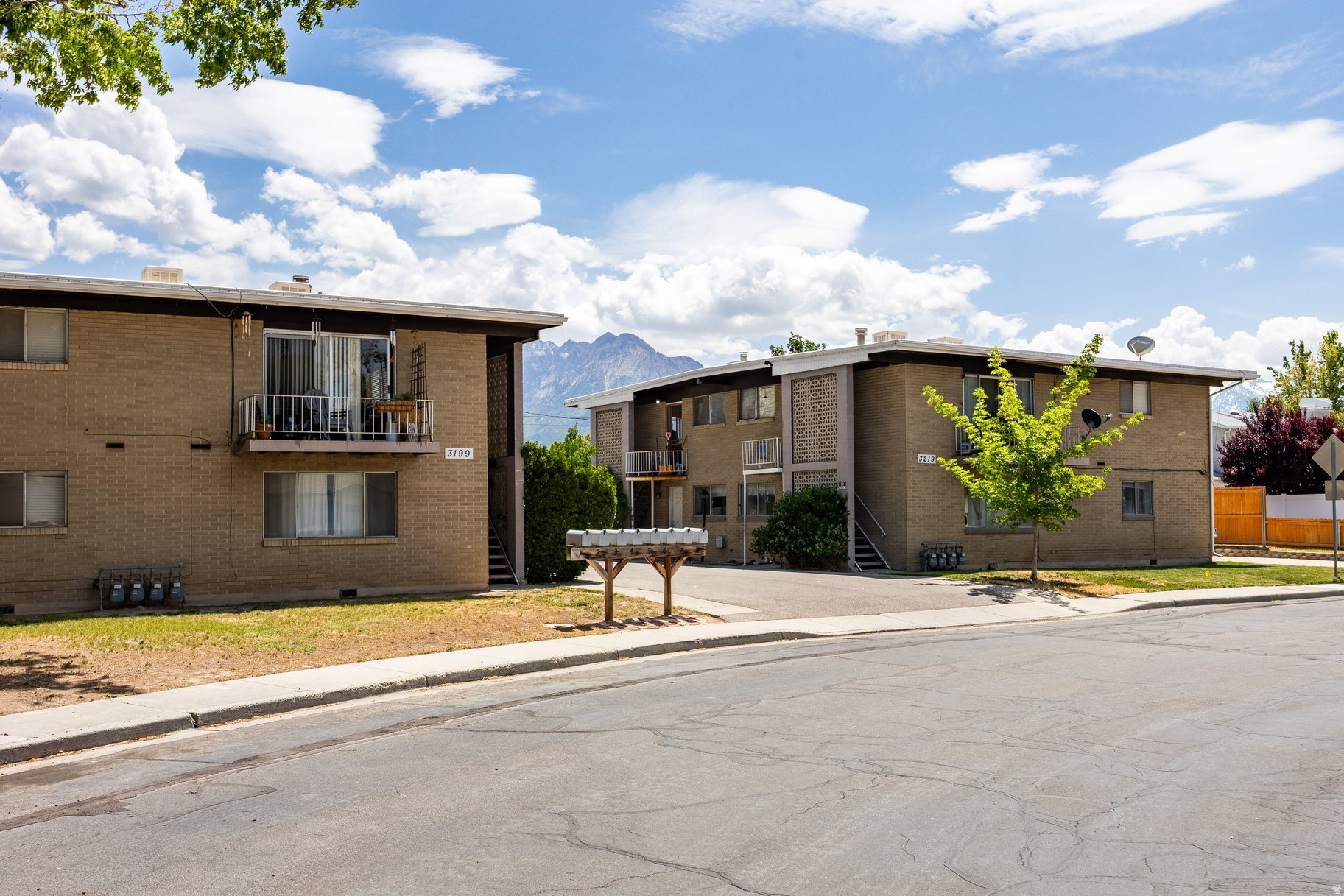 Eight 2 Bedroom/1 Bathroom apartments in two buildings on two levels in a peaceful South Salt Lake location. Lots of upside to these fully-occupied  investment properties. Two tax IDs. Ten carport spaces and eight storage lockers, plus a maintenance shed. Walking distance to schools, parks, library, eats and drinks.