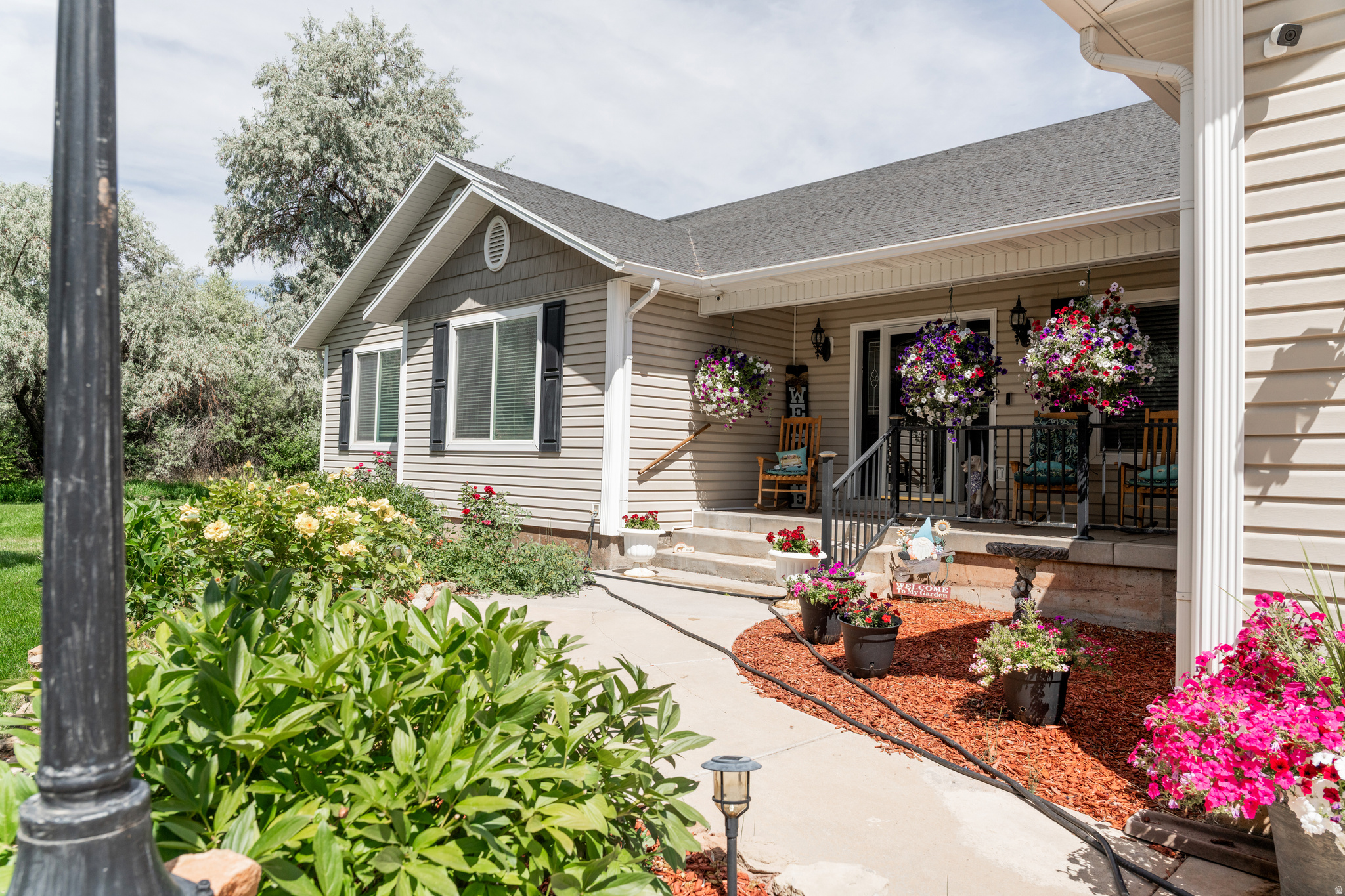 This rare find in Lapoint really has it all! Desert oasis complete with in ground pool and 1,500 sf covered patio with outdoor kitchen! 3,044 Square Foot home all on one level with 5 spacious bedrooms, 2.5 bathrooms, oversized living room and kitchen with attached 3 car insulated garage plus immaculate 24'X24' heated shop with car lift! Custom updated and upgraded kitchen includes leather granite counter top, Kucht industrial convection oven and range, industrial hood, pot filler, lvp flooring and kitchen aid refrigerator and microwave. Spacious primary suite has walk in closet complete with bolted down gun safe, shower with dual rain shower heads, large soaking tub and sliding door to deck with propane fire pit. Covered patio is vaulted, cedar plank lined with lots of recessed lighting and 6 fans. Also includes outdoor kitchen with granite counter tops, island with industrial built in griddle, built in gas grill, built in 6 burner range, sink, stainless steel roller drawers and mini fridge! 20'X40' fully fenced heated pool with in water tanning deck, gazebo with trex deck and tiki bar! Insulated and heated shop with car lifts wired for 220 and will also include some of the work benches and tool boxes. Let's not forget that is is also horse property complete with hay storage, pens, newer fencing and BIA water shares! Horse panels stay. Too many extras to name them all! This Property is on greenbelt, Buyer's responsibility to maintain greenbelt. Square foot per county records. Buyer to verify all information including square foot.