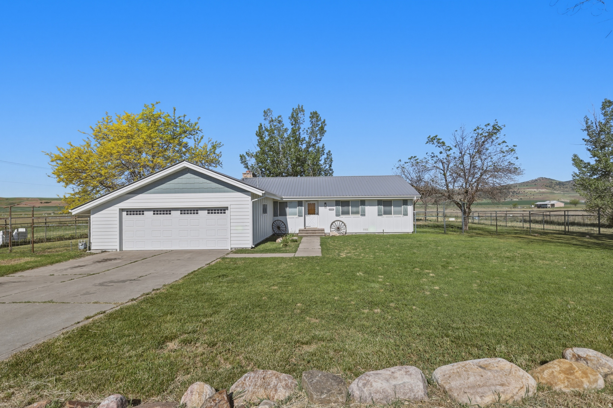 Country living at its finest! This unique property was previously operated as a mink farm, but the possibilities here are endless. Situated on 6.59 acres, the property features a 1,134 sq. ft. home with 3 bedrooms and 1 bathroom, along with multiple outbuildings ready to fit your vision. Included are two 36' x 400' mink sheds equipped with power, automatic watering systems, and cages with an approximate capacity of 5,000 mink. The cages can also be removed, creating excellent space for storage, livestock, corrals, or other agricultural uses. In addition, the property offers two 30' x 40' shops, one of which is fully finished with insulation and electricity. Whether you're looking to continue the current operation, start a new business venture, or simply enjoy country living with room to grow, this property offers incredible potential. Call today to schedule your private showing! 24-hour notice required. Tenant occupied.  All information herein is deemed reliable but is not guaranteed. Buyer and buyer agent is responsible to verify all listing information, including square feet/ acreage, to buyer's own.