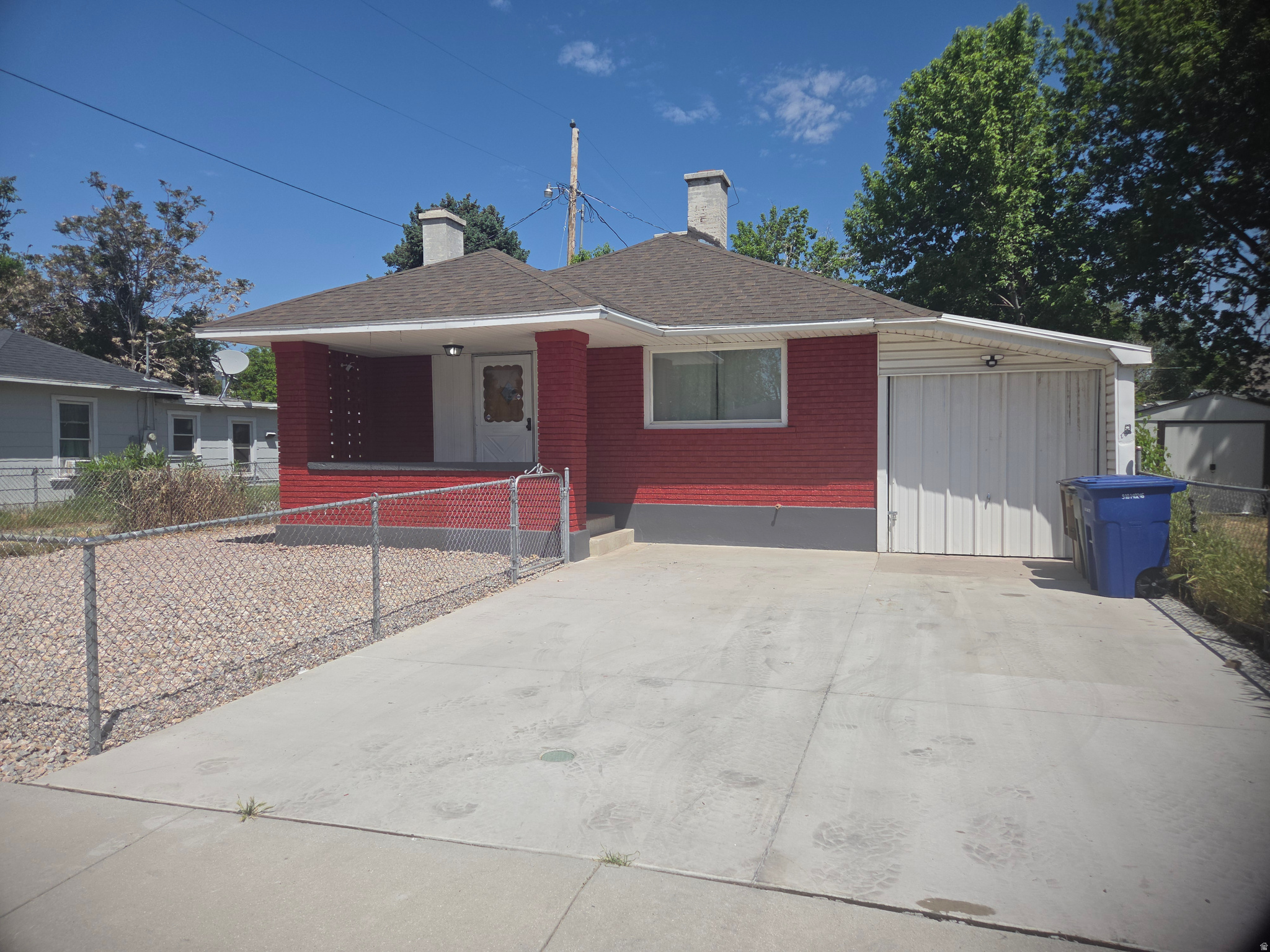 Cute lil Bungalow in the heart of Rose Park, Wont find anything cleaner at this price. Remodeled in 2022/2023 including full electrical, full plumbing even the main sewer line into the home, new paint, new flooring (laminate over existing original hardwood floors), new CENTRAL AIR, new bathroom, disposal and dishwasher, Stainless steel appliances, fridge stays, all gas appliances, new closets, ceiling fans in every room, wood burning fireplace. tons of storage, 432 sq ft basement with 9 ft ceilings, 352 Sq ft storage on side of home, large storage shed/workshop in back yard, full automatic sprinkers in backyard,  owner/ agent   Square footage figures are provided as a courtesy estimate only and were obtained from  SL County records .  Buyer is advised to obtain an independent measurement.