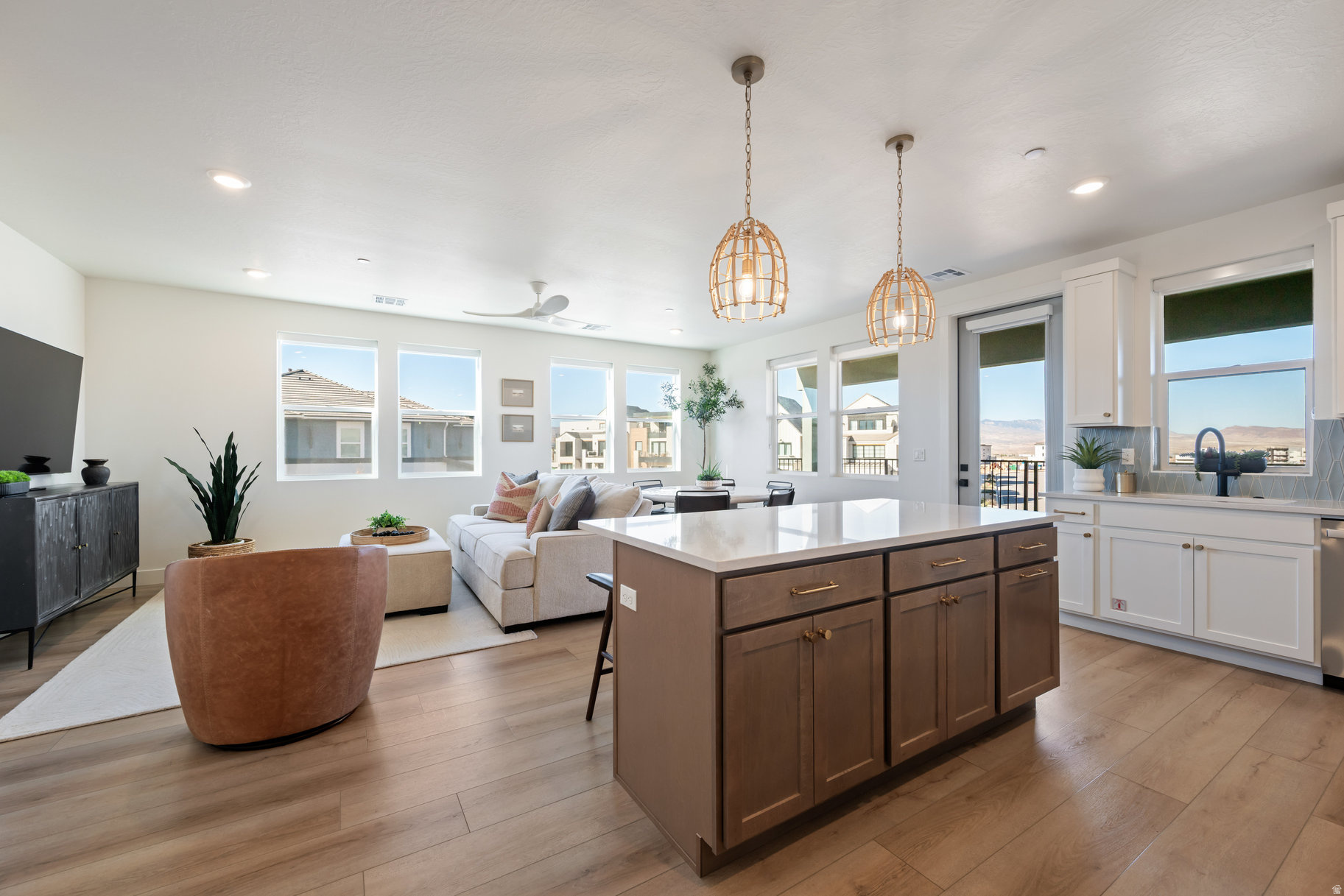 Fully furnished and completely rental-ready, this spectacular corner-unit condo is located in the highly sought-after Desert Color Resort community!This 3-bedroom, 2-bath unit offers abundant natural light, expansive windows, and an open, airy floor plan. Start your day with coffee and end it with breathtaking sunsets on the spacious covered patio.  Enjoy the convenience of a 2-car garageand a prime locationwithinsteps of Desert Color's premier amenities, including the breathtaking 2.5-acre lagoon with white sandy beaches, paddleboarding, kayaking, heated pools, hot tubs, pickleball courts, parks, and miles of scenic walking trails. Desert Color truly offers the ultimate Southern Utah resort lifestyle.  This turnkey property is ideal as a primary residence, vacation getaway, or income-producing rental.  Ask about our preferred lender credit - get 1% of the loan amount (up to $5,000) back to help with closing costs, lender fees, or rate buy-downs.  Rental history and financials available upon request.
