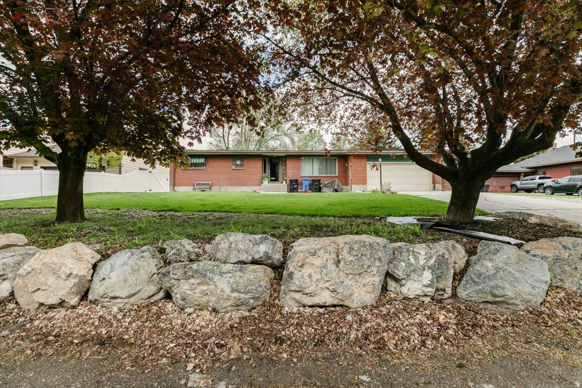 Check out this beautifully updated home with an open floor plan. Fully remodeled kitchen and family room. Newly installed solar panels. Salon with separate entrance. Fully enclosed backyard patio. Fully fenced yard with basketball court. Mountain views. Directly across from the community center and park. Fully landscaped yard with mature trees. Square footage figures are provided as a courtesy estimate only and were obtained from county records. Buyer is advised to obtain an independent measurement. Buyer to verify all information.