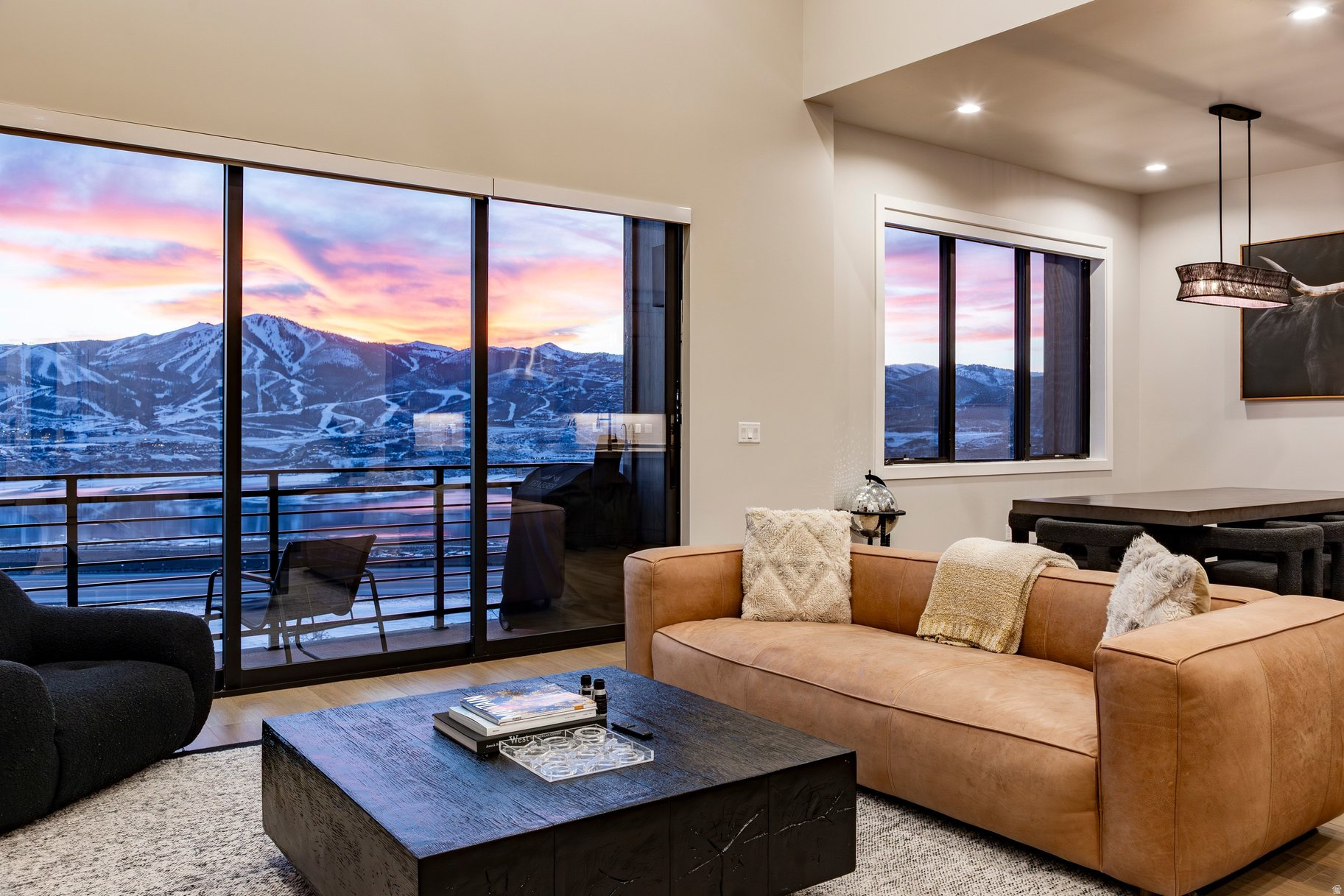 There are nice views and there are serious VIEWS!  This home has that "wow" factor that only Park City's majestic backdrop can provide when you look out of each window.  Located just a short five minute drive to the new Deer Valley East Village via a non-congested route, this location will have you skiing or enjoying water sports at Jordanelle State Park in mere minutes.  Built in 2022, the interiors offer contemporary, earthy finishes and palette that everyone seeks in a home or vacation rental complete with kitchen aid appliances, a hot tub outside and high quality cabinetry and counters throughout. This is a top ranked vacation rental property with an excellent reputation for guest satisfaction with moderate usage.  This home is offered turn key and ready to enjoy right away.  Just bring your skis and toothbrush.  This is a must see!