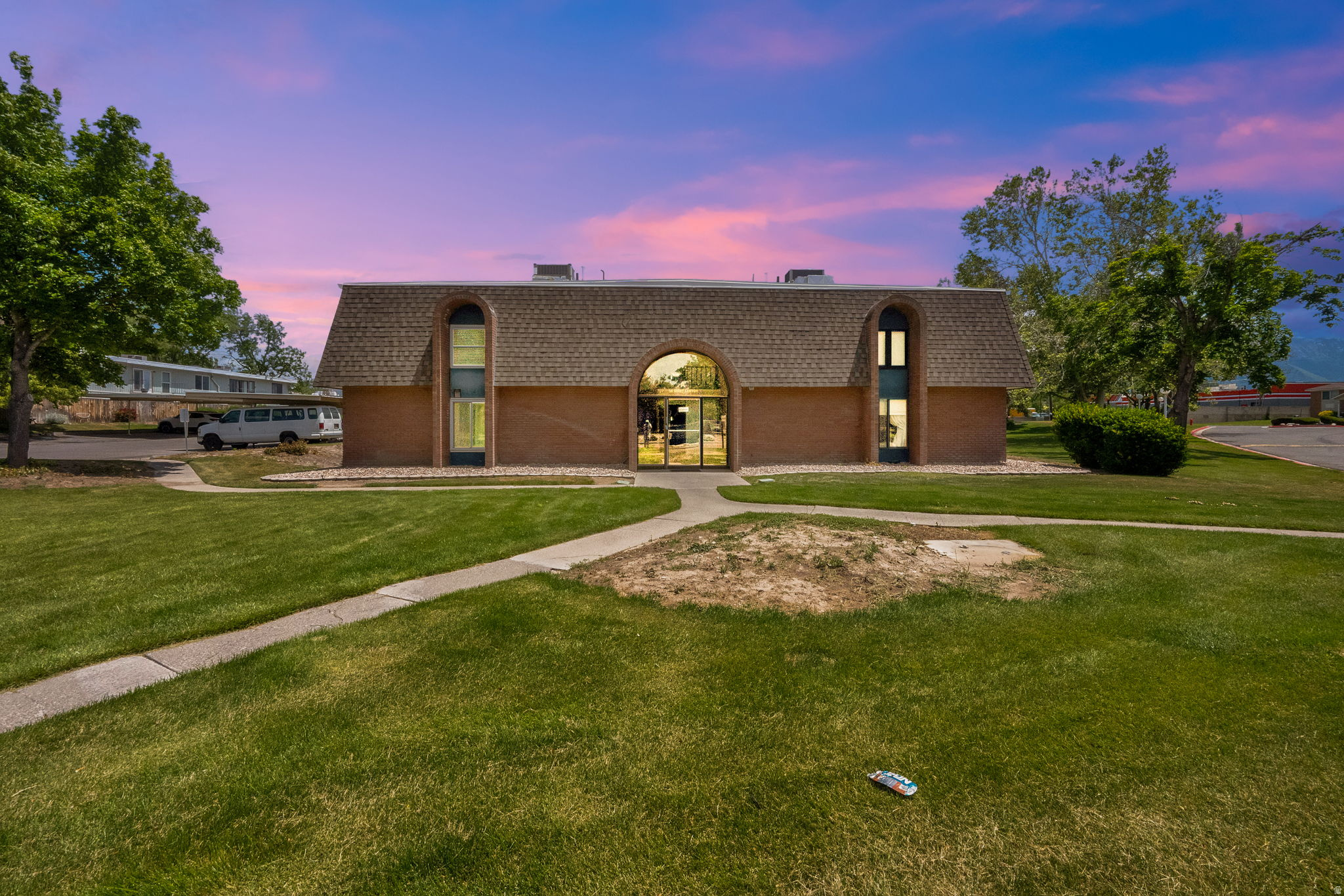 Perfectly located in the heart of the valley, this updated condo combines comfort, convenience, and modern style in one easy-to-love package. Inside, you'll find thoughtful upgrades throughout including a completely updated kitchen, range, dishwasher, updated bathrooms, new lighting, smoke detectors, and more. The layout offers a spacious closet, in-unit laundry, and comfortable living spaces that make everyday life easy. Outside, the community is beautifully maintained with mature trees, lush landscaping, expansive common areas, and a pool to enjoy during the summer months. Conveniently located near Trax, shopping, dining, and freeway access, this condo puts you close to everything while still offering a peaceful place to call home.