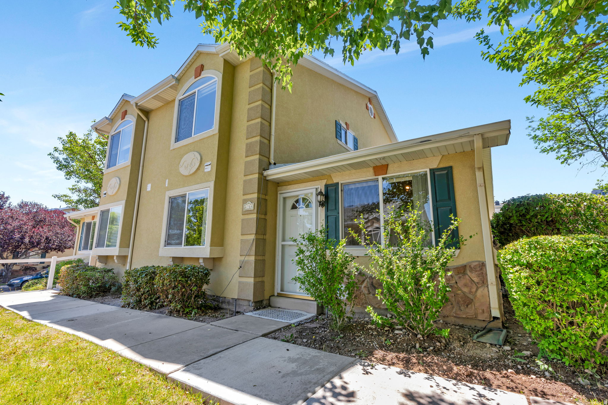 Welcome to this cozy townhome in a quiet, well-maintained neighborhood in the heart of West Jordan! Single-level living with a main-floor primary suite & laundry. This home has been well cared for and offers new carpet throughout, 3 spacious bedrooms, 3 bathrooms, a private fenced patio, and 2-car garage plus additional parking next to the garage.  All appliances including washer and dryer are included. Enjoy low-maintenance living with HOA covering water, sewer, trash, exterior maintenance, and insurance. Community amenities include a clubhouse, pool, playground, and fitness room. Prime location near schools, shopping, dining, Bangerter Highway, and freeway access. Don't miss seeing this home!