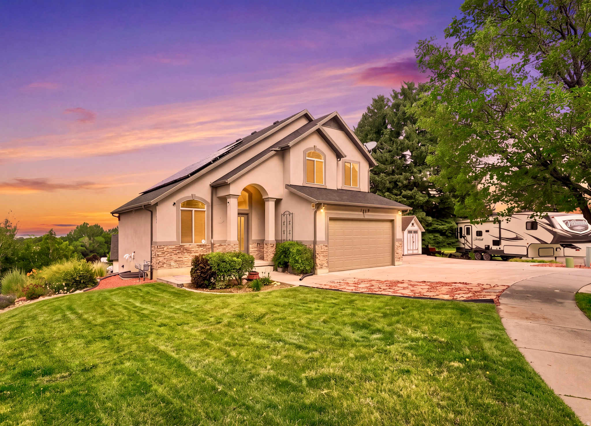 GET A LOWER INTEREST RATE - SELLER IS OFFERING a 2:1 BUYDOWN or $16,000 toward CLOSING COSTS when you use our preferred lender ...***...    Beautiful East Bench CUL-DE-SAC home with SOLAR PANELS, a DAYLIGHT WALKOUT ADU, breathtaking MOUNTAIN and SUNSET VIEWS, and NO HOA!   The sellers have invested approximately $100,000 in UPDATES over the past 1.5 years.   So much to love, including NEW high-quality LVP FLOORING and BRAND-NEW APPLIANCES throughout the home.   Nestled at the base of the mountains, this home enjoys a spectacular mountain backdrop that feels just beyond your backyard.   Take in stunning sunsets from your Living Room, Kitchen, and Primary Suite.    The Mother-in-Law Apartment/ ADU features its own SEPARATE ENTRANCE, KITCHEN, and LAUNDRY hookups.    Unwind in the backyard HOT TUB while enjoying breathtaking mountain views and unforgettable sunsets.   Enjoy the benefits of SOLAR PANELS, helping keep your electricity bills low year-round.   The LOCATION is unbeatable!    Just minutes from schools, shopping, dining, and entertainment, with quick access to hiking and biking trails, Ogden Canyon, Snowbasin Resort, and Pineview Reservoir.     This home offers the perfect blend of outdoor adventure and everyday convenience.   This is the home you've been waiting for-schedule your private showing today!   Photos are virtually staged to illustrate the home's potential. The home is vacant. Information and measurements are provided as a courtesy only. Buyers are advised to verify all information and obtain their own measurements.