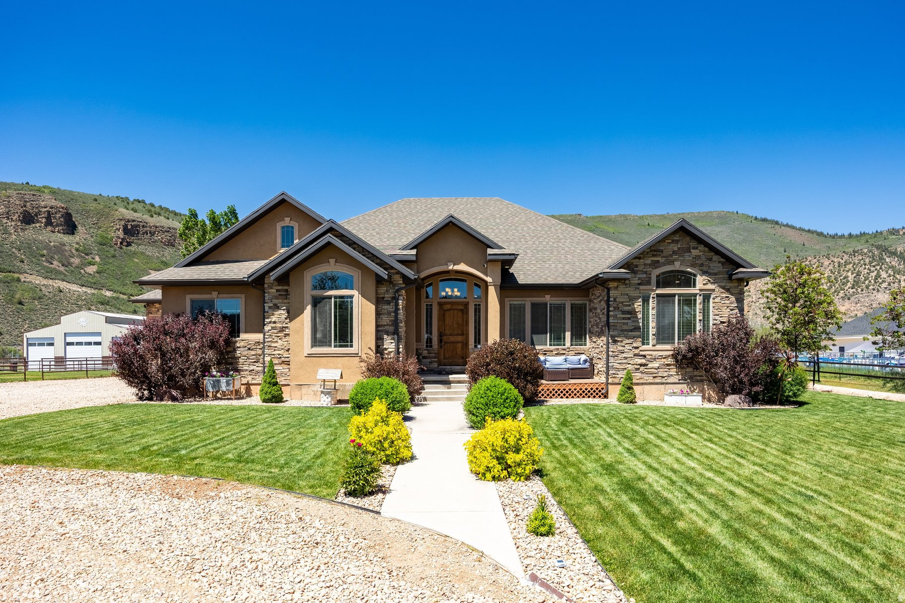 Tucked into the scenic landscape of Hanna, Utah, this 4-bedroom, 2.5-bath home sits on a beautifully landscaped 1-acre lot with a private walking easement directly to the Duchesne River - giving you exclusive, gated access to some of the region's best fly fishing, just steps from your back door. Whether you're searching for a Duchesne County recreational property, a Hanna UT horse property, or a mountain home near world-class fishing, this listing delivers all three. The home offers 2,065 square feet of finished living space, with an additional 2,089 square feet of unfinished basement ready to be customized into extra bedrooms, a rec room, home gym, or whatever fits your lifestyle. Outdoors, a fenced horse pasture makes this an ideal equestrian property, while a spacious 3-car garage provides room for all your gear - or enjoy your very own golf simulator for year-round practice. For those who love to host, the property includes a carport with full 5th wheel hookups, perfect for weekend guests, family gatherings, or hauling in your camper for a Duchesne River getaway. With 4,154 square feet under roof, this Hanna, UT property blends space, recreation, and long-term potential for buyers seeking a true Utah mountain retreat.