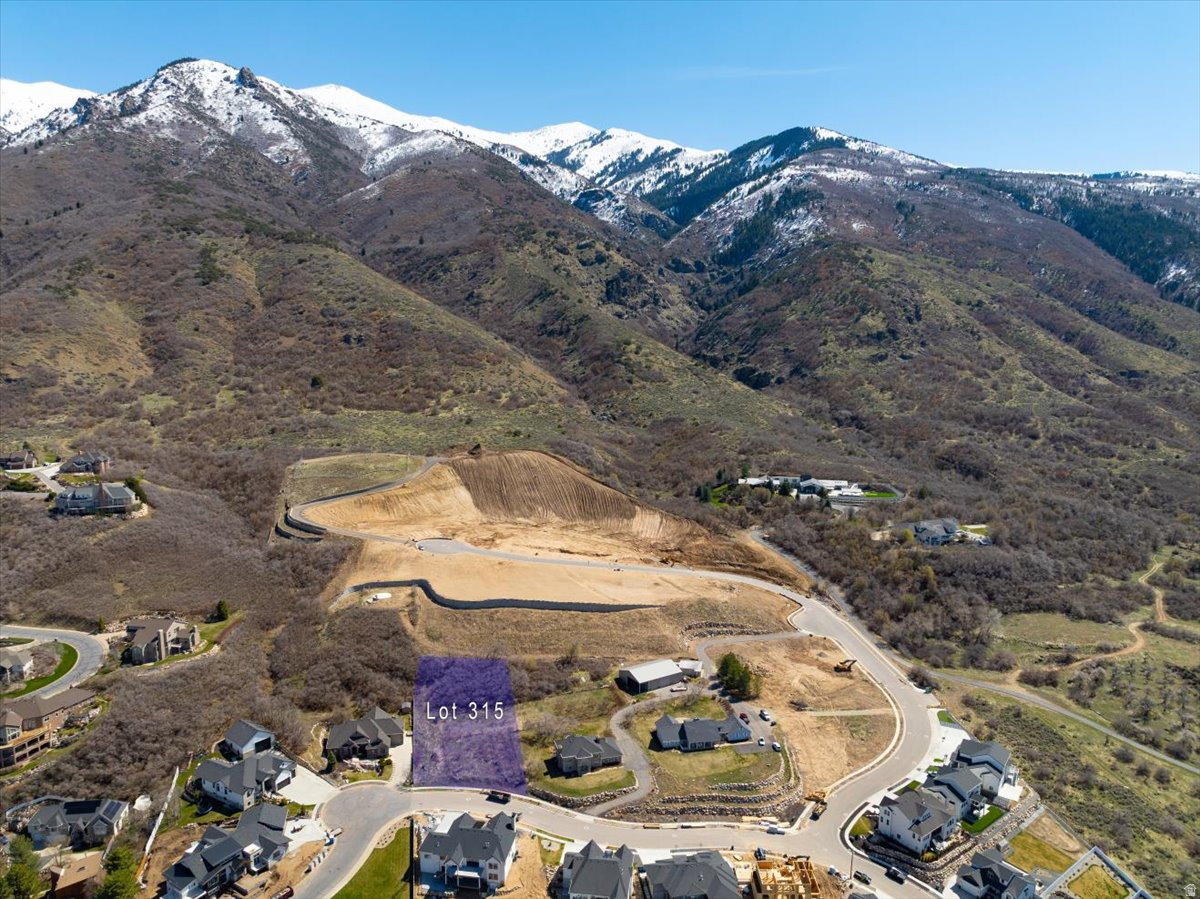 This is a one of a kind lot in the Orchard Ridge Estates neighborhood.  Great building envelope with thick scrub oak in the far back yard hillside.  recent topo and survey included.  Ready for your dream home design.  All utilities are stubbed.  Hiking and biking on exclusive access to trails.  10 minutes to Station Park and Frontrunner Station, 20 minutes to ski resorts, lakes, and other recreational venues, easy access to HWY 89. Bring your own builder or use one we recommend.