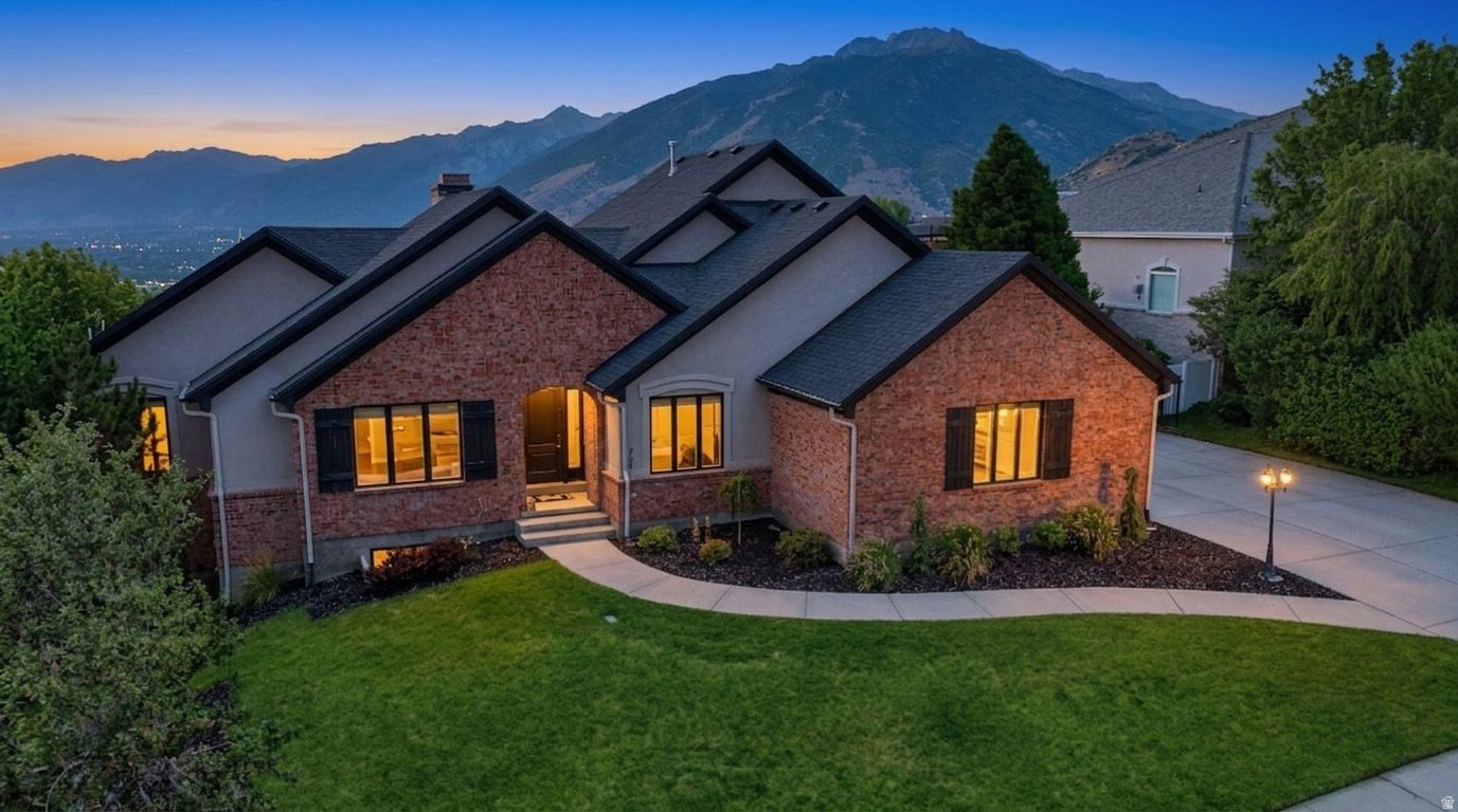 Coming Soon! Experience luxury living in this exceptional custom home located in the prestigious gated community of Draper Heights. Offering over 6,300 square feet, this beautifully designed residence features 5 bedrooms, 5 bathrooms, and an ideal floor plan for both everyday living and grand-scale entertaining. Designed with versatility and comfort in mind, the home includes two full kitchens, making it ideal for multigenerational living, guest accommodations, or effortless entertaining. Premium amenities include a private home theater, home gym, and abundant storage throughout, including a spacious storage room and additional overhead storage above the 3-car garage. Expansive picture windows flood the home with natural light while framing breathtaking, unobstructed panoramic views of the Salt Lake Valley and surrounding Wasatch Mountains. Step outside to relax in the private hot tub and enjoy spectacular sunsets, or take advantage of the nearby hiking and biking trails just minutes from your doorstep. Located in one of Draper's most desirable luxury neighborhoods, this home offers the perfect combination of privacy, elegance, and convenience with easy access to world-class outdoor recreation, shopping, dining, and commuter routes. A rare opportunity to own a luxury custom home with incredible views, premium amenities, and unmatched quality in Draper Heights.   Square footage figures are provided as a courtesy estimate only. Buyer is advised to obtain an independent measurement.