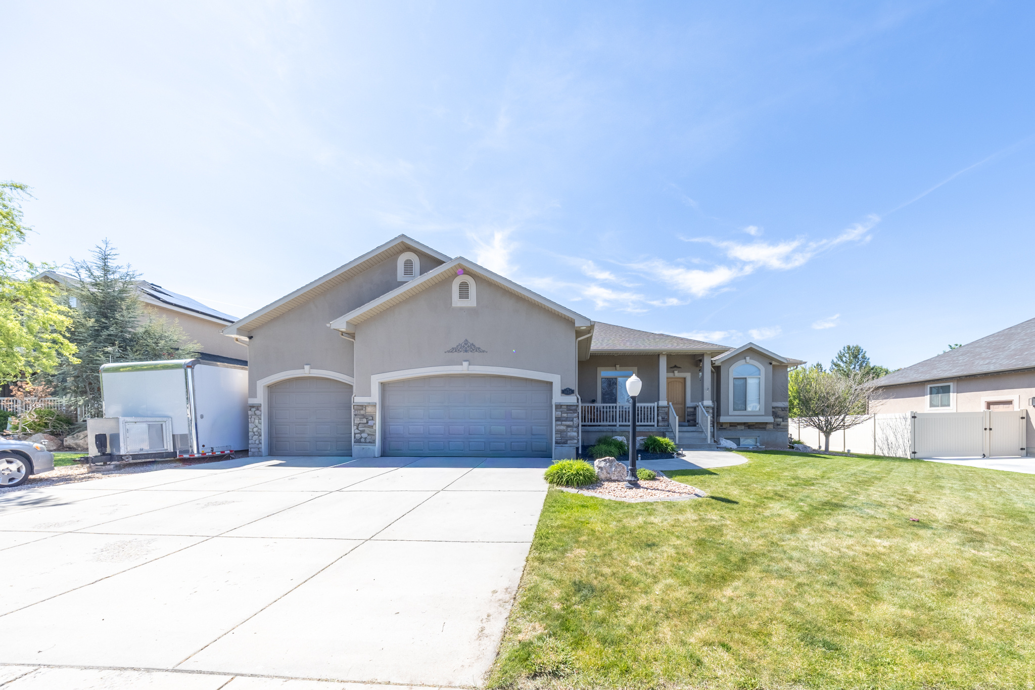 Beautiful rambler located in a desirable neighborhood close to shopping, schools, and everyday conveniences! This well-maintained home features 3 bedrooms, 2 bathrooms, vaulted ceilings, and an open-concept layout with spacious living areas and abundant natural light. The kitchen offers ample cabinet and counter space and flows seamlessly into the dining and family room areas, making it perfect for everyday living and entertaining. The oversized primary suite includes a large bathroom and walk-in closet. Enjoy the convenience of a 3-car garage with an extra-deep third bay, plus additional RV parking for all your toys and storage needs. The backyard provides plenty of space to relax, play, or entertain. The unfinished basement offers incredible potential for future bedrooms, a family room, theater room, gym, or additional storage - ready for you to make it your own! This home combines comfort, space, and opportunity in a fantastic location.   Square footage figures are provided as a courtesy estimate only and were obtained from county records.  Buyer is advised to obtain an independent measurement.