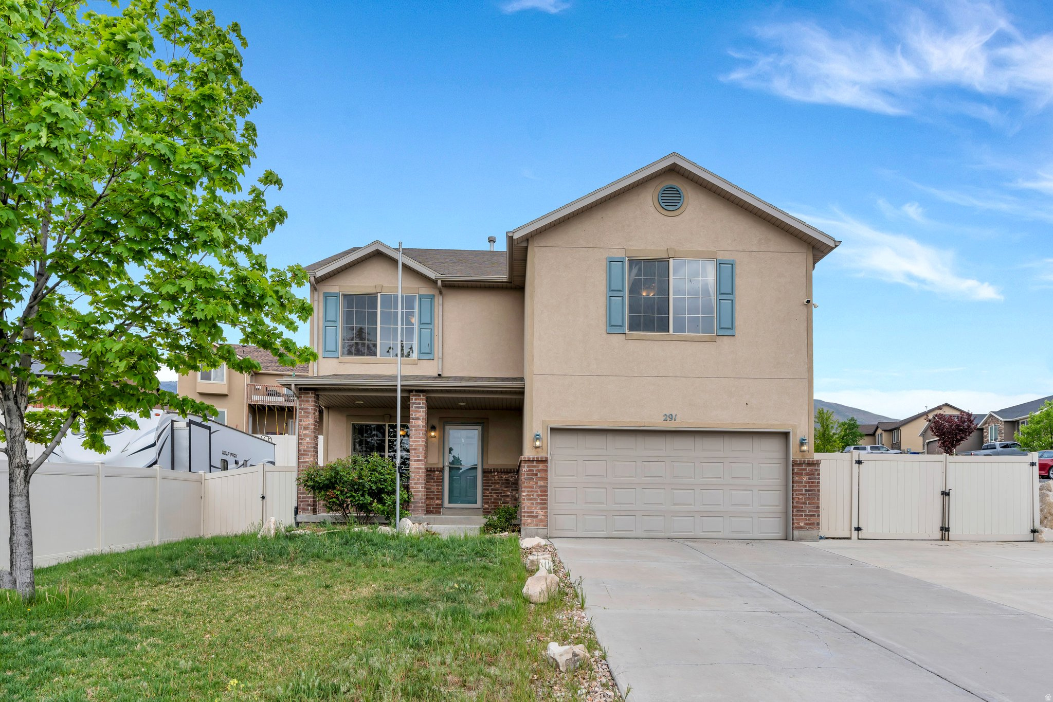 Huge Price Reduction  Exceptional Saratoga Springs Home with Lake & Mountain Views! Don't miss this incredible opportunity to own a beautifully maintained home in one of Saratoga Springs' most convenient and desirable neighborhoods. Ideally situated with quick access to Redwood Road, this property combines everyday convenience with breathtaking views of both the Wasatch Mountains and Utah Lake. Step inside to discover a welcoming and thoughtfully designed interior featuring a spacious kitchen that serves as the heart of the home. The custom-built island provides abundant workspace, storage, and seating, making it perfect for meal preparation, entertaining guests, or gathering with family. The open and functional layout flows seamlessly throughout the home, creating comfortable living spaces for every lifestyle. The generously sized bedrooms offer plenty of room to relax and unwind, while the expansive primary suite provides a true retreat with ample space for a sitting area, home office nook, or additional furnishings. Recent updates in the basement include beautifully renovated bedrooms and a modernized bathroom, adding both value and versatility to the home. Outside, you'll appreciate the thoughtfully terraced backyard, which offers multiple levels for gardening, outdoor recreation, entertaining, or simply enjoying the surrounding scenery. Whether you're cultivating a garden, creating a play area, or hosting summer gatherings, this outdoor space provides endless possibilities. Additional highlights include a large RV parking area along the side of the home, offering convenient storage for recreational vehicles, trailers, boats, or extra parking needs. The home is also pre-wired with a Vivint Security System for added peace of mind and modern convenience. Electric vehicle owners will love the dedicated EV charging station located in the garage, making daily charging simple and efficient. With its stunning views, spacious layout, recent updates, desirable features, and significant price reduction, this home presents an outstanding value and a rare opportunity in today's market. Square footage figures are provided as a courtesy estimate only and were obtained from county tax records. Buyer is advised to obtain an independent measurement.