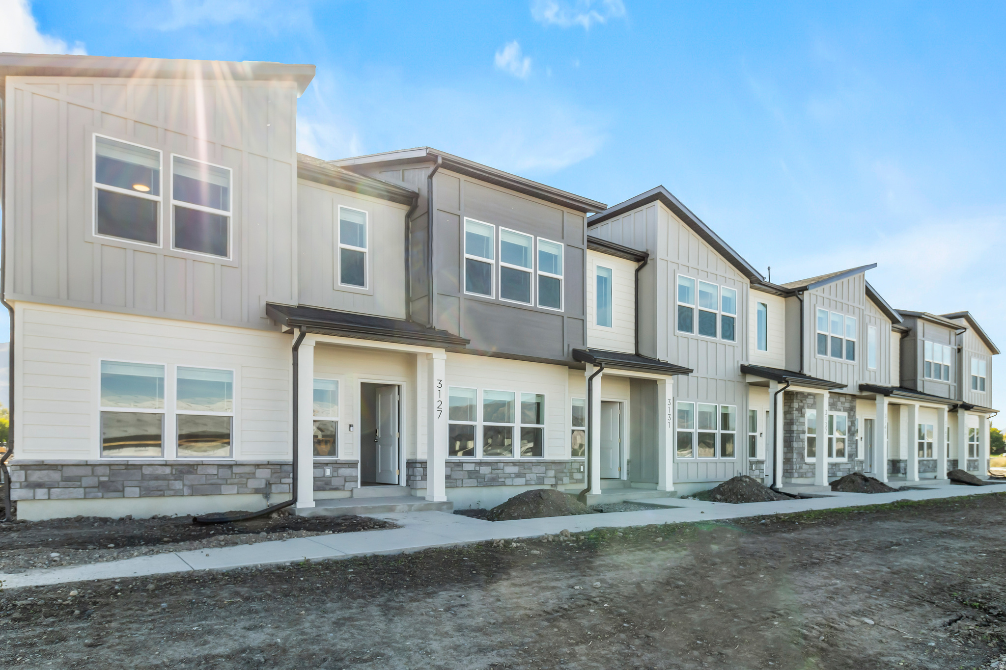 Here is the Sitka townhome in the heart of Nibley in Visionary's Ridgeline Park community! This 2-story floor plan features 3 beds and 2.5 baths, with all the bedrooms on the second floor as well as two bathrooms. Intentional, well-thought-out space on the main floor for open concept living with an additional half bath on the main floor and a two-car garage. The Ridgeline Park community is focused on "Community" living with amenities such as walking trails, a clubhouse, pool, pickleball courts, and a future city park that is underway (concept attached!) The home is remarkably easy to see. Be done with maintenance and fixer-uppers, and come and get a brand new home with a warranty today! *Photos of the home are not of the exact unit*