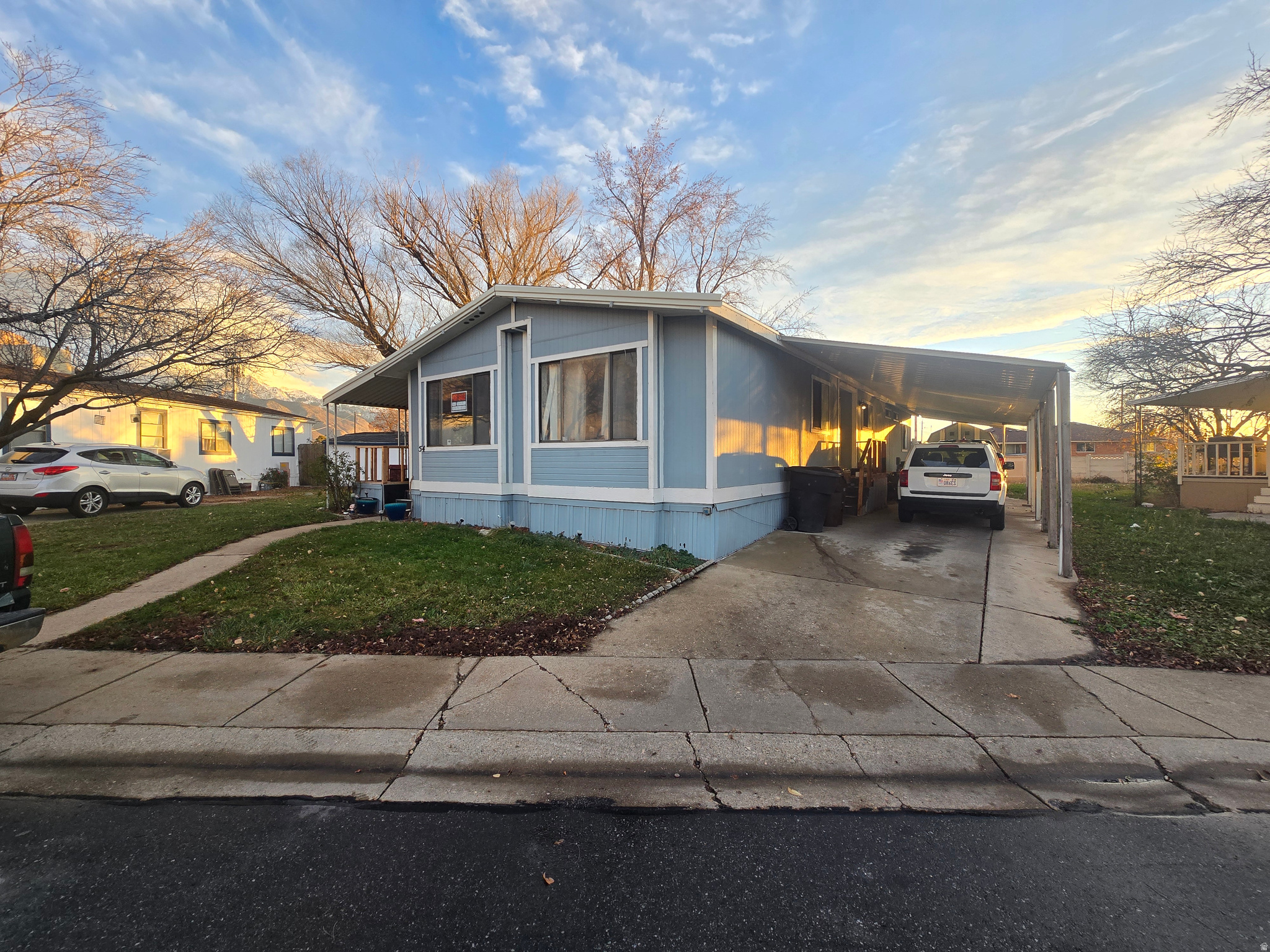Great home with newer roof, furnace, central air, and water heater!  Large open floor plan, large bedrooms, primary suite, and tons of covered parking!
