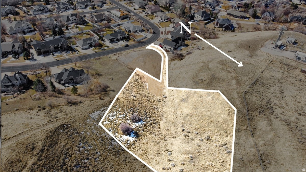 Enjoy beautiful mountain views from this lot that is tucked away on Winding Way in Logan's Cliffside neighborhood. This 1.36 acre lot is just minutes from downtown Logan and a short jaunt to all Cache Valley has to offer. Bring your own builder, utilities are close by. Buyer advised to verify all information.