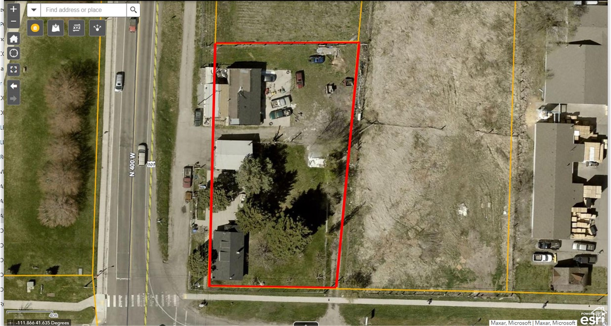 Great investment opportunity! Hyrum City has zoning as C-2 multi-use. County has current use as residential. It is a non-conforming property. Entrances are off Main Street and 400 West. Possible for live-work units, daycare, karate space, auto shop, and more....  Call Hyrum City to verify your business idea and requirements. See residential MLS #  MLS# 2060482. Square footage figures are provided as a courtesy estimate only. Buyer is advised to obtain an independent measurement.