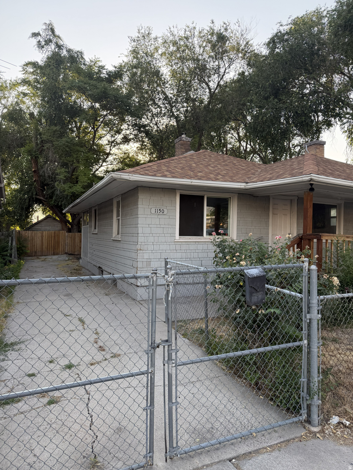 Square footage figures are provided as a courtesy estimate only and were obtained from County Records. Buyer is advised to obtain an independent measurement. Bungalow located in the Downtown area. Walking distance to the Ballpark and Liberty Park. Easy access to TRAX and UTA Bus lines.Has newer interior and exterior paint, a newer roof, updated electrical and plumbing, and ample off-street parking. This home is zoned Residential-On-Commercial and could be used as commercial space.