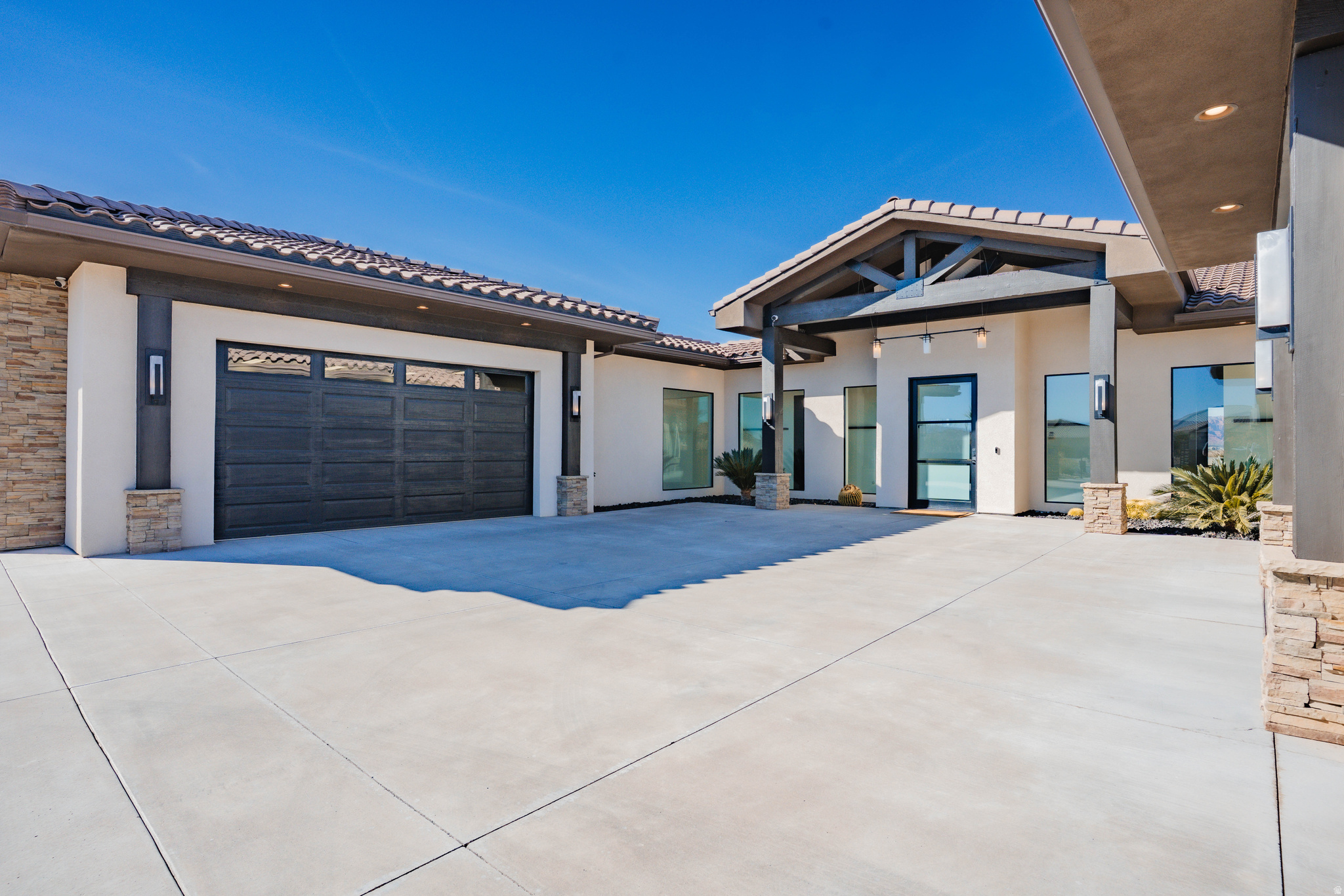 ~New Listing: 180 Snow Canyon Views!~ If luxury real estate speaks to you then look no further...enjoy elevated desert living with breathtaking 180 panoramic views of Snow Canyon State Park, perfectly framed from this exceptional residence. Designed for both luxury and comfort, the home features a full suite of premium Wolf appliances, ideal for effortless entertaining all year long! A $50,000 upgraded AC system ensures optimal efficiency and year-round comfort, while a private gated entrance to the driveway adds an extra layer of exclusivity and security. With a thoughtfully designed primary suite & secondary suite with additional custom features throughout, this home seamlessly blends high-end upgrades with stunning natural surroundings of Southern Utah! Come see it today!