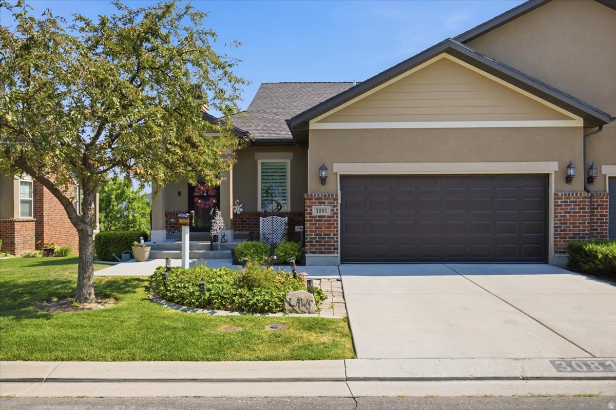 Executive-style end unit in the highly desirable Towns at Ivory Highlands, featuring views of the entire valley. Enjoy the seamless functionality of true main-level living- bedroom, bathroom, kitchen, family room, and dining area all on the main floor.  These one story end units rarely hit the market. The fully finished walk-out basement expands the living space with a large family room, two additional bedrooms, and a full bath. The kitchen has been updated with new quartz countertops. Main bathroom has also been remodeled. Hand-scraped hardwood floors on the main floor. Newer HVAC system (installed 2024) and a high-efficiency tankless water heater.