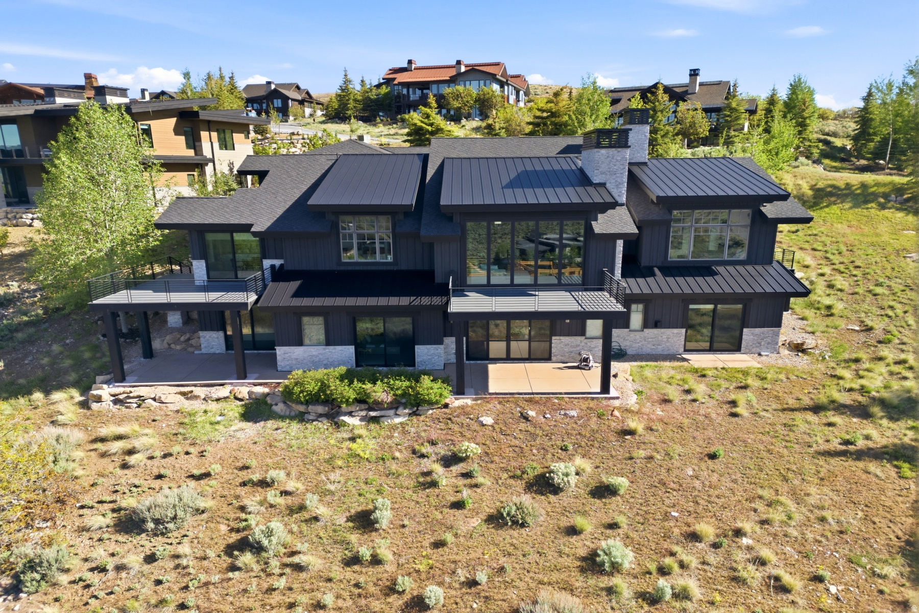 Newly Remodeled Home with big Deer Valley Views and a Full Membership Available!  If you're looking for a newly remodeled move-in ready custom home with airplane views of Deer Valley and Park City Mountain in Promontory, and a Full Membership available, look no further. This home offers (4) generous en-suite bedrooms, with the primary and office on the main level. This home was completely overhauled inside as well as the exterior with light bright finishes, new radiant driveway, and new epoxied 3-car garage. This home is conveniently located just two minutes from the main gate. Being offered fully furnished by Dressed Design. Just minutes from downtown Park City, Promontory stretches over 7,200 acres and is the perfect four-season mountain club for all ages, offering a wide array of activities for the whole family. The club currently offers (18) completed amenity venues to use including private ski lodges at Park City Mountain Resort and Deer Valley.