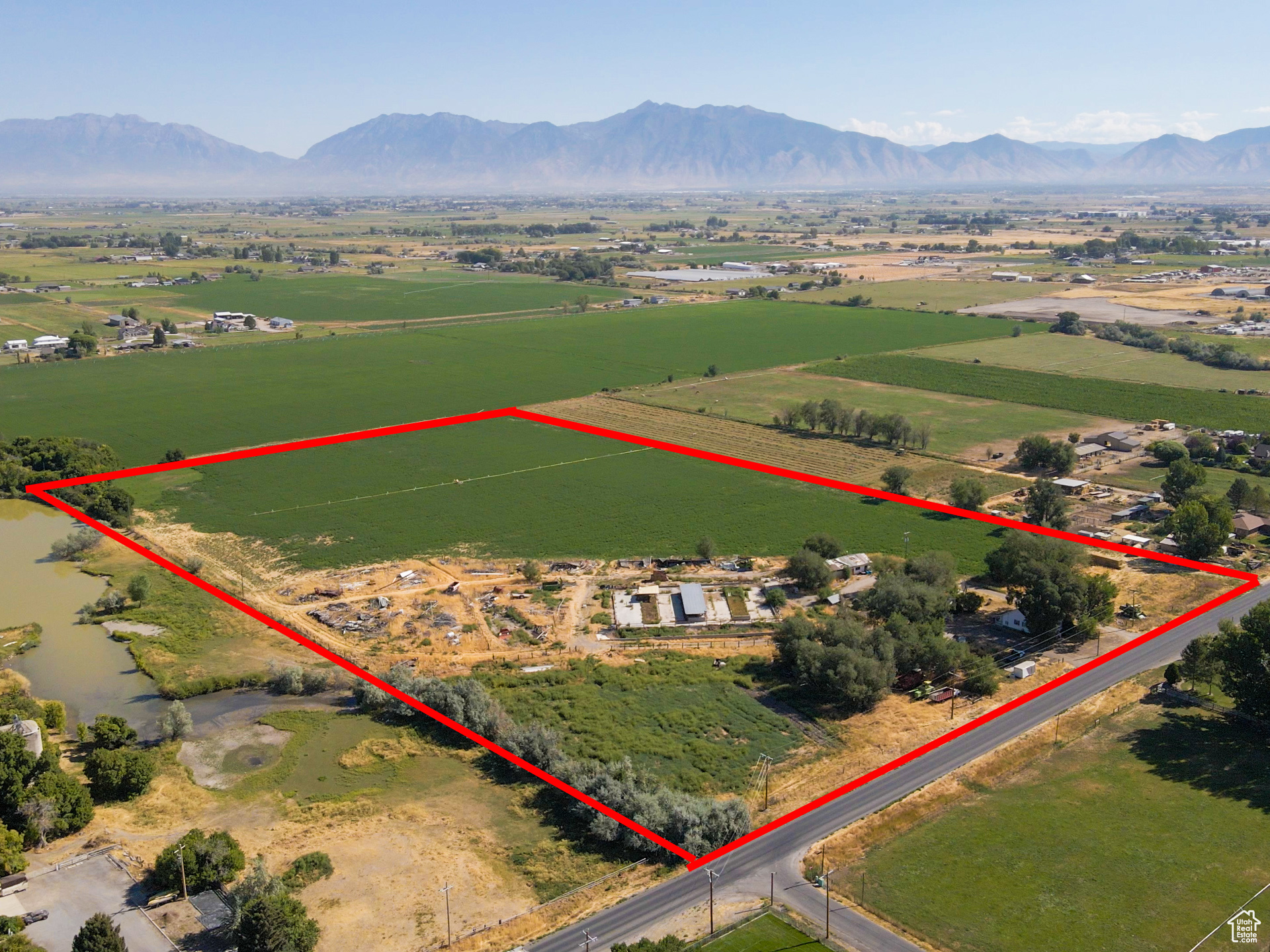This 22+ acre property has been cherished by the same family for over 60 years, a testament to its rich history and enduring value. With 44+ water shares-more than enough to sustain and expand farming operations-it offers both productivity and potential. The land is ideal for continued agriculture, whether for crops, livestock, or future development, and stands as a rare opportunity to own a well-watered, generational piece of farmland."   Please check out the tour! Can be subdivided!  Square footage figures are provided as a courtesy estimate only and were obtained from county records.  Buyer is advised to obtain an independent measurement.