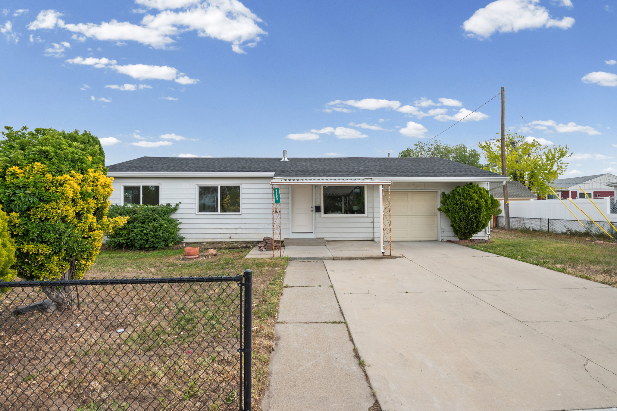 Freshly remodeled and move in ready.  With 962 square feet, the home has a simple and easy layout that makes great use of the space. The updated kitchen gives the home a fresh feel, while the remodel throughout helps make it move-in ready from day one. Outside, the .14 acre lot offers a 1-car garage and two driveways, giving you useful parking and added flexibility. The location is also convenient, with quick access to I-215 and Bangerter Highway for an easier commute around the valley. If you are looking for an updated home with practical parking, a garage, and a clean layout, this is a great one to see.   Square footage figures are provided as a courtesy estimate only and were obtained from county records .  Buyer is advised to obtain an independent measurement.