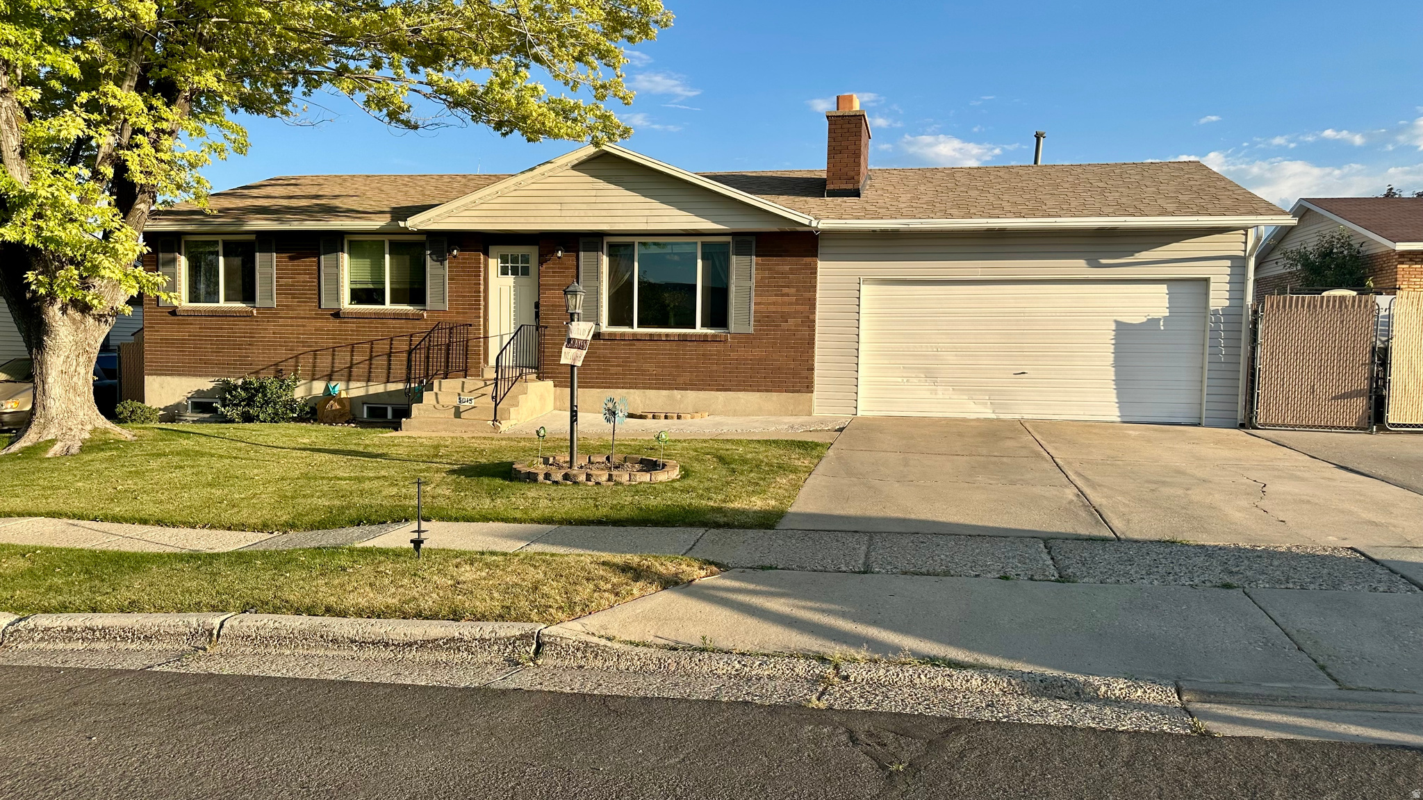 Welcome home to this beautifully updated brick rambler tucked away on a quiet cul-de-sac in a highly convenient location! Offering 5 bedrooms, 2 bathrooms, and multiple gathering spaces, this move-in-ready home combines timeless charm with extensive modern upgrades completed over the past several years. The heart of the home is the stunning remodeled kitchen (2023), featuring updated finishes, newer appliances (2020), and a functional layout perfect for everyday living and entertaining. The main-floor bathroom has been tastefully remodeled (2026), while newer carpet (2025) adds comfort and warmth throughout. Downstairs, you'll find a spacious family room enhanced by a custom rock accent wall and cozy electric fireplace (2022), creating the perfect space for movie nights, game days, or relaxing with family and friends. Major improvements provide peace of mind for years to come, including a new roof (2020), water heater (2024), custom seamless gutters (2024), water softener system (2025), and brand-new siding (2026). Outside, the fully fenced backyard features privacy slats, a low-maintenance Trex deck, and a beautiful gazebo (2025), offering an ideal setting for summer barbecues, outdoor dining, and entertaining. Conveniently located near shopping, dining, entertainment, parks, Oquirrh Park Fitness Center, and the Utah Olympic Oval, you'll enjoy easy access to recreation and everyday amenities while still appreciating the tranquility of a quiet neighborhood setting. With thoughtful updates, generous living space, and a long list of recent improvements, this is the kind of home buyers wait for-schedule your private showing today! Square footage figures are provided as a courtesy estimate only and were obtained by county records. Buyer is advised to verify all listing information.