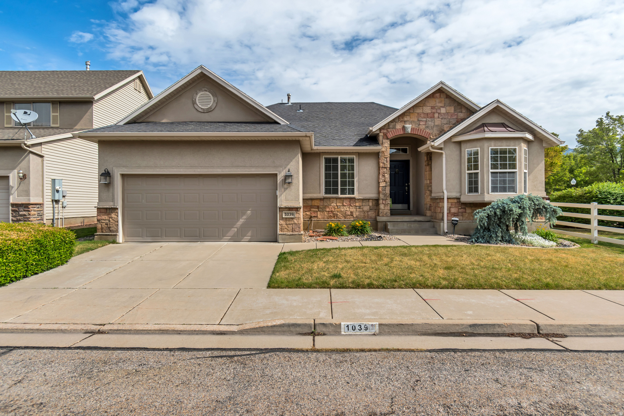 Ready to move in! Gorgeous mountain views from this incredible home in a great Layton location, close to Hill AFB and Hwy 89. Conveniently located near shopping, restaurants, and parks. This home features built-in shelves, walk-in closets, ample storage, spacious bedrooms, vaulted ceilings, granite countertops, and many unique details throughout-including new flooring and fresh paint. Stove, dishwasher, refrigerator, washer, and dryer all included. 100% finished basement with oversized living room with built-in shelving. Enjoy the common space and gazebo behind the home with a beautiful park-like atmosphere right out your back door. This rambler is a must-see!