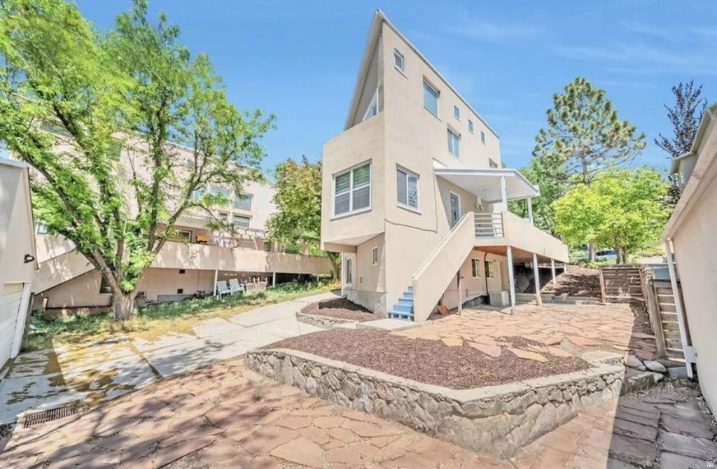 Seller hosted OPEN HOUSE Saturday, June 13th from 12:00-2:00!!  Nestled in the heart of Salt Lake City's coveted Capitol Hill neighborhood. This 4-bedroom, 2.5-bath residence offers the perfect balance of classic charm and modern functionality, all within minutes of downtown, City Creek Canyon, and the Utah State Capitol. Step inside to find a bright, open living space with vaulted ceilings and large windows that fill the home with natural light. The kitchen features contemporary cabinetry, Bosch stainless steel appliances, with mountain and valley views. The bedrooms are generously sized, and the primary suite includes a walk-in closet and private balcony accessed through a French door. Enjoy peaceful evenings on the private deck or entertain in the xeri-scaped backyard. Additional highlights include a two-car garage and endless hot water with the ultra efficient tankless water heater. Perfect for those seeking urban convenience in a quiet, historic neighborhood, this home is a rare find in one of Salt Lake's most desirable locations.
