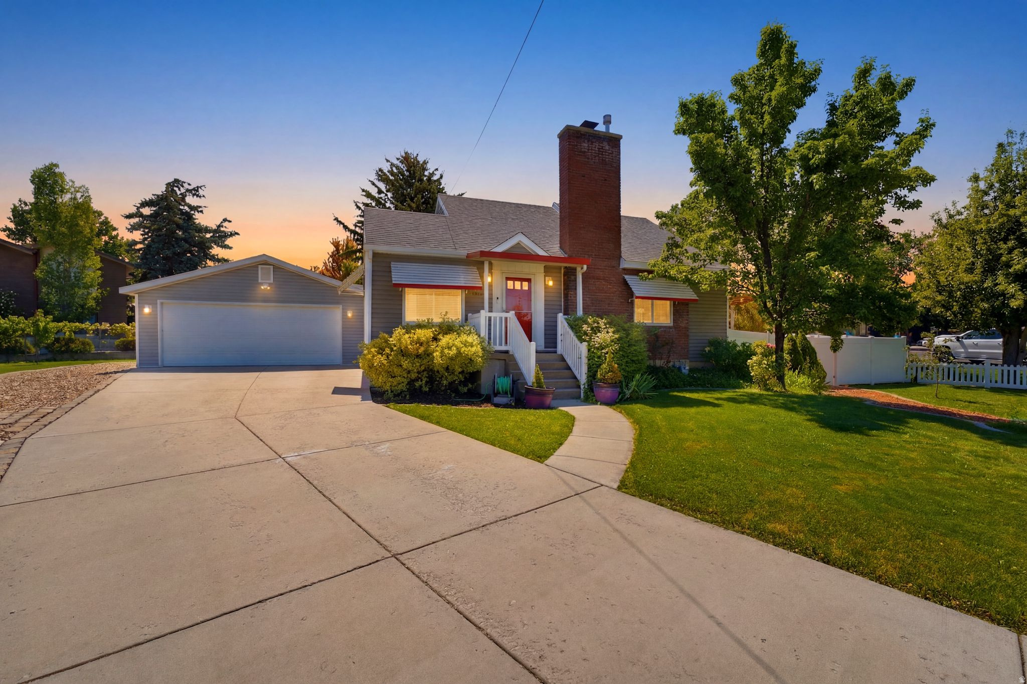 This charming move-in-ready Bountiful home blends timeless character with modern convenience. Inside, you'll find original hardwood floors, fresh paint, updated countertops, stainless steel appliances, a farmhouse sink, a five-burner gas range, and an oven with built-in air fry functionality. The home offers a convenient step-free entrance, providing easy access for strollers, moving furniture, grocery trips, guests with limited mobility, or anyone who simply prefers to avoid stairs.   Major improvements provide peace of mind, including a roof and all windows replaced within the last 10 years. The water softener, whole-house filtration system, and reverse osmosis drinking water system are all approximately one year old, with all water filters replaced in December 2025.  Step outside to a backyard designed to be enjoyed. A beautiful pergola creates the perfect space for outdoor dining, entertaining, or simply unwinding, surrounded by mature landscaping and an incredible variety of fruit-bearing plants. Harvest from two apple trees, two cherry trees, a peach tree, blackberry and raspberry bushes, plus three varieties of grapevines.  The home also includes a Wyze video doorbell that connects to Wi-Fi with no monthly subscription required. The refrigerator, washer, and dryer are all included.  Enjoy the convenience of a central Bountiful location with easy access to shopping, dining, parks, schools, and I-15, while coming home to a yard that feels like your own private retreat. Thoughtful updates, established landscaping, and inviting outdoor living make this home one you won't want to miss.