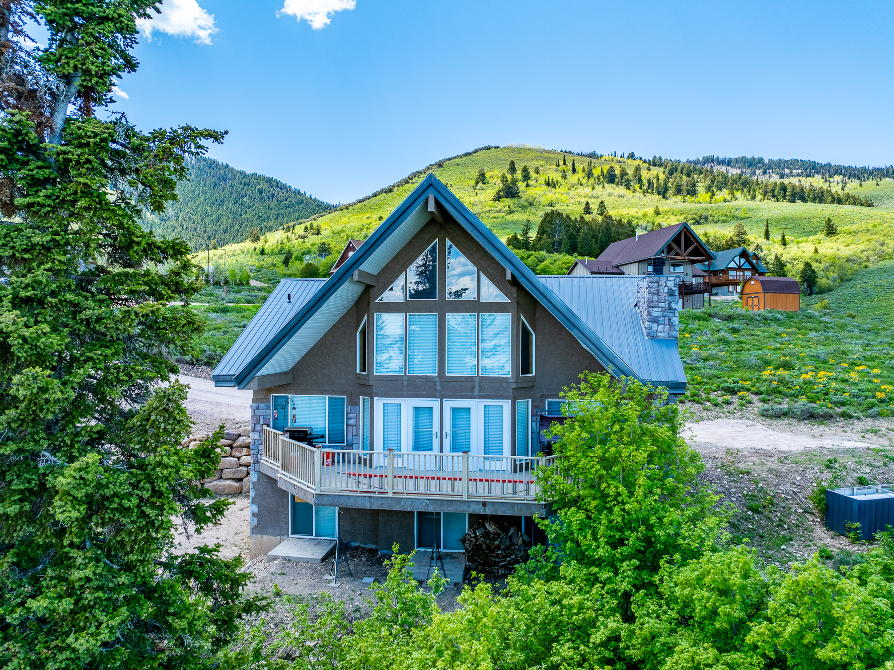 Located in beautiful Bear Lake West just over the Idaho border in Fish Haven, ID.  Beautiful views of the lake and mountains.  Open loft used as an extra sleeping and family room.  Ride from this home and explore miles of trails for ATV/snowmobiling.  HOA amenities include: Beach Access, discounts on golf, swimming, hot tub and tennis/pickleball.  No short-term rental allowed.     Square footage figures are provided as a courtesy estimate only. Buyer is advised to obtain an independent measurement.