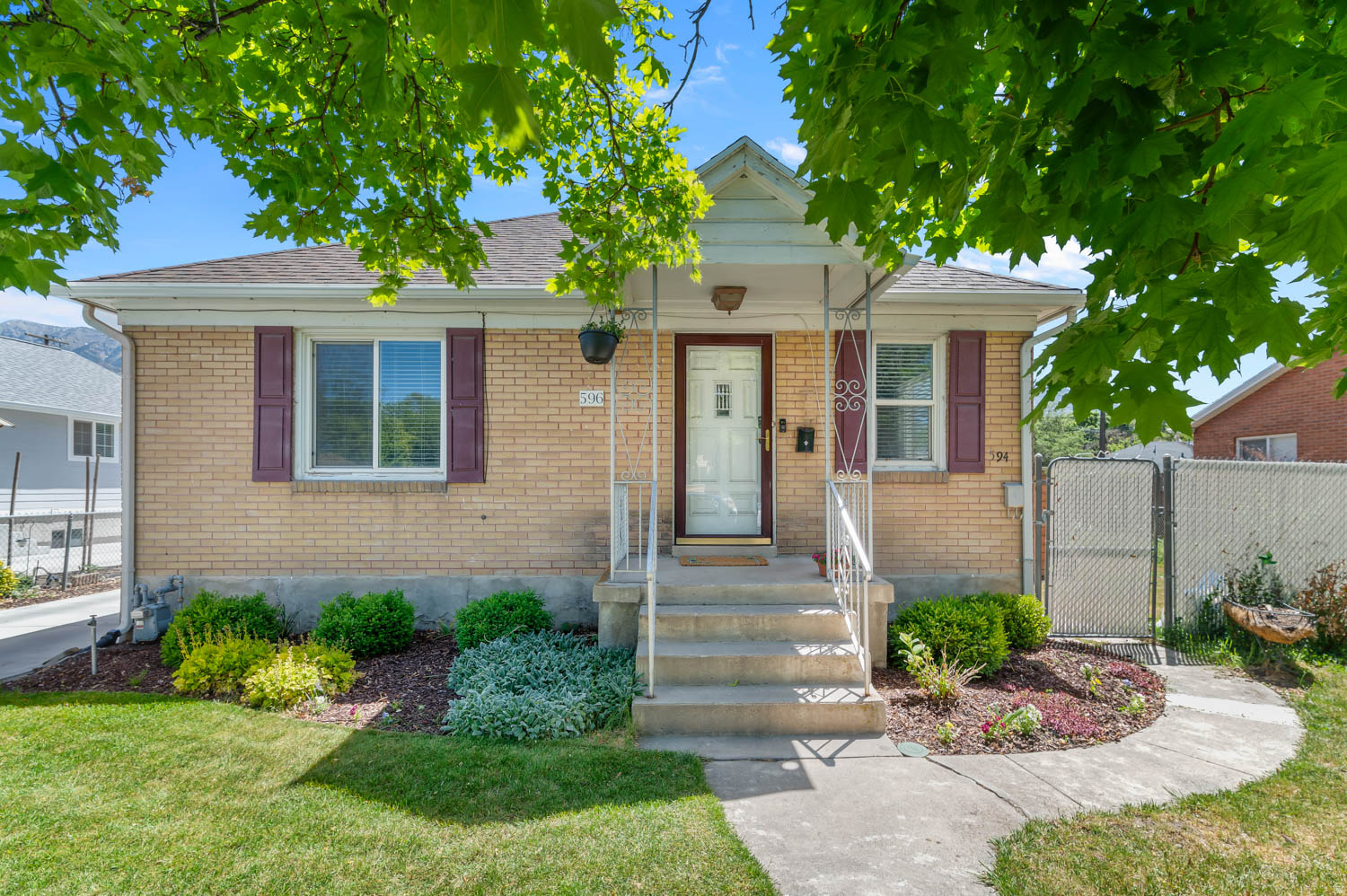 Welcome to this darling home nestled in the heart of Provo - with built-in income potential! Located close to BYU/UVU, Utah Valley Hospital, the Provo Rec Center, and easy access to I-15. The upstairs features 2 bd/1 bath with a bright, comfortable living space. Downstairs offers a legal furnished basement apartment with 1 bd/1bath and a shared laundry room, previously leased for $1,375 per month. The primary bath has been completely remodeled along with updates to the home's interior wiring, electrical meters, and an additional electrical panel in the garage. The beautifully landscaped property, with automatic sprinklers and drip system, offers two separate fenced yards. A new detached accessory building (80 sq ft with heating and air) currently serves as a home office, with ethernet wiring for internet access. Square footage figures are provided as a courtesy estimate. The buyer is advised to obtain an independent measurement.