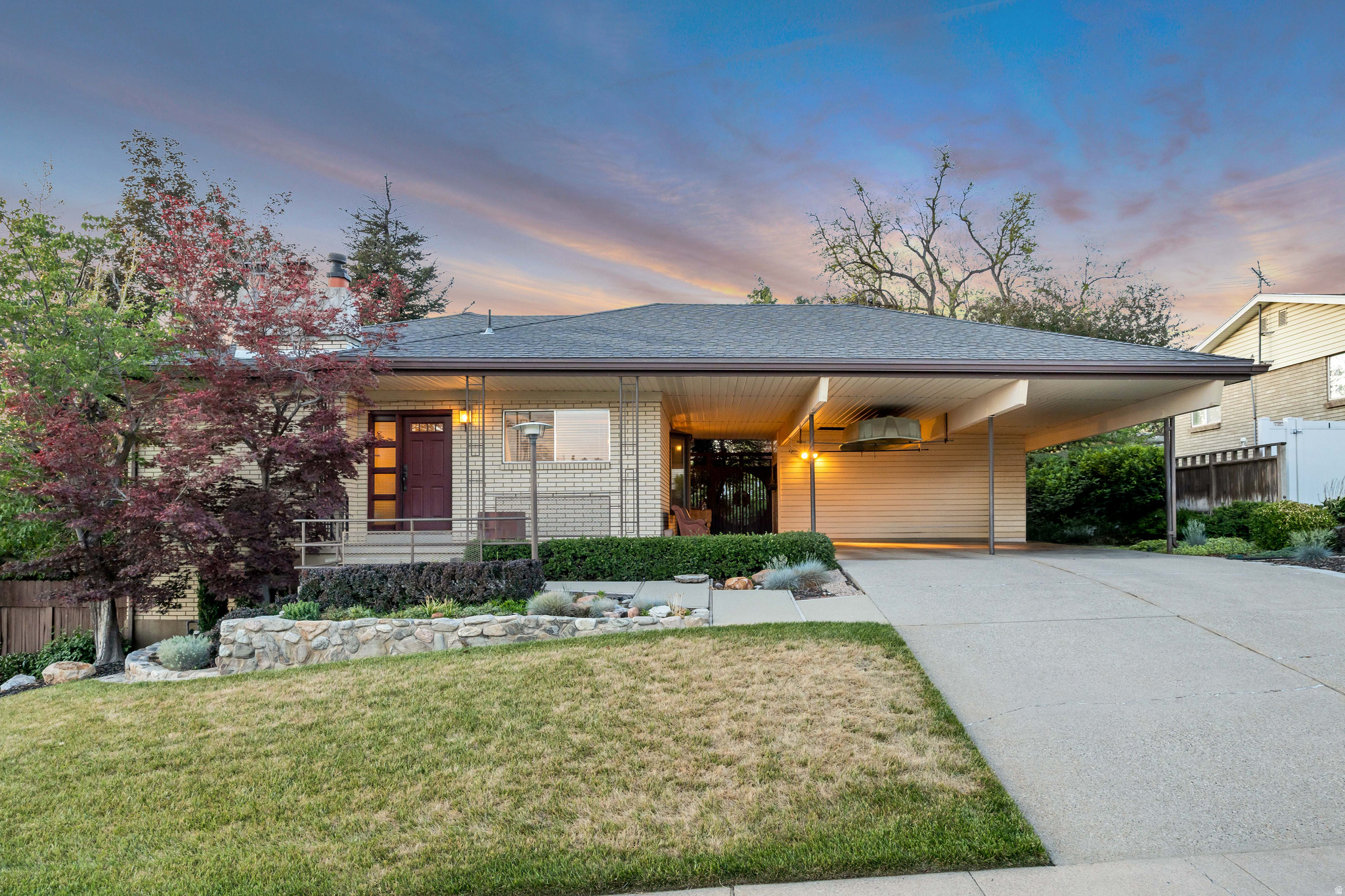 Exceptional location w/ sweeping views & seasonal creek backdrop. Finished basement w/ elevated ceilings + indoor garden room. Professionally landscaped lot by a credentialed landscape architect - apple, pear & peach trees built for entertaining. Large food storage rm, abundant interior & exterior storage, clothes chute & newer HVAC. A rare find with space, function & setting that's hard to match at this price point.