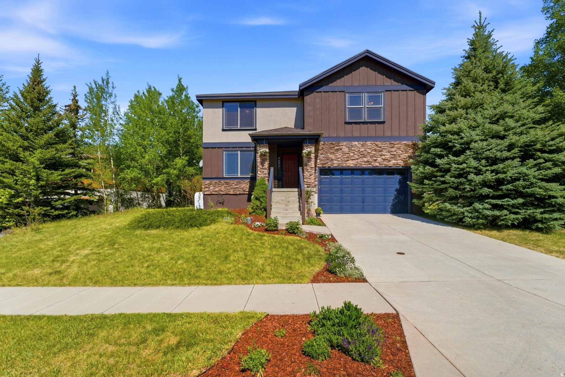 Discover this inviting 4-bedroom, 3.5-bath family-friendly home in the highly sought-after Trailside neighborhood. Outstanding views and bordered by open space in both front and back! Thoughtfully designed for both comfort and functionality, this residence features spacious living areas and a welcoming kitchen ideal for gathering and entertaining. All four expansive bedrooms are conveniently located on the second floor, and three include roomy walk-in closets. A versatile upstairs loft provides additional living space, separation, and privacy. Step outside to a generous backyard, featuring a built-in stone patio, the perfect setting to relax and take in the stunning views of Utah's renowned mountain resorts. This location is unbeatable, only a few minutes' walk from Trailside Park, Trailside Elementary, and the Round Valley trail system, offering miles and miles of hiking, biking, and outdoor recreation just outside the front door. Park City's world-class ski resorts, Historic Main Street, exceptional dining, and year-round entertainment are only minutes away, plus the added benefit of an easy commute to Salt Lake City, providing the ideal balance of mountain adventure and everyday convenience. A rare opportunity to own in the beloved Trailside community, this home offers the lifestyle, location, and comfort to be enjoyed for years to come.