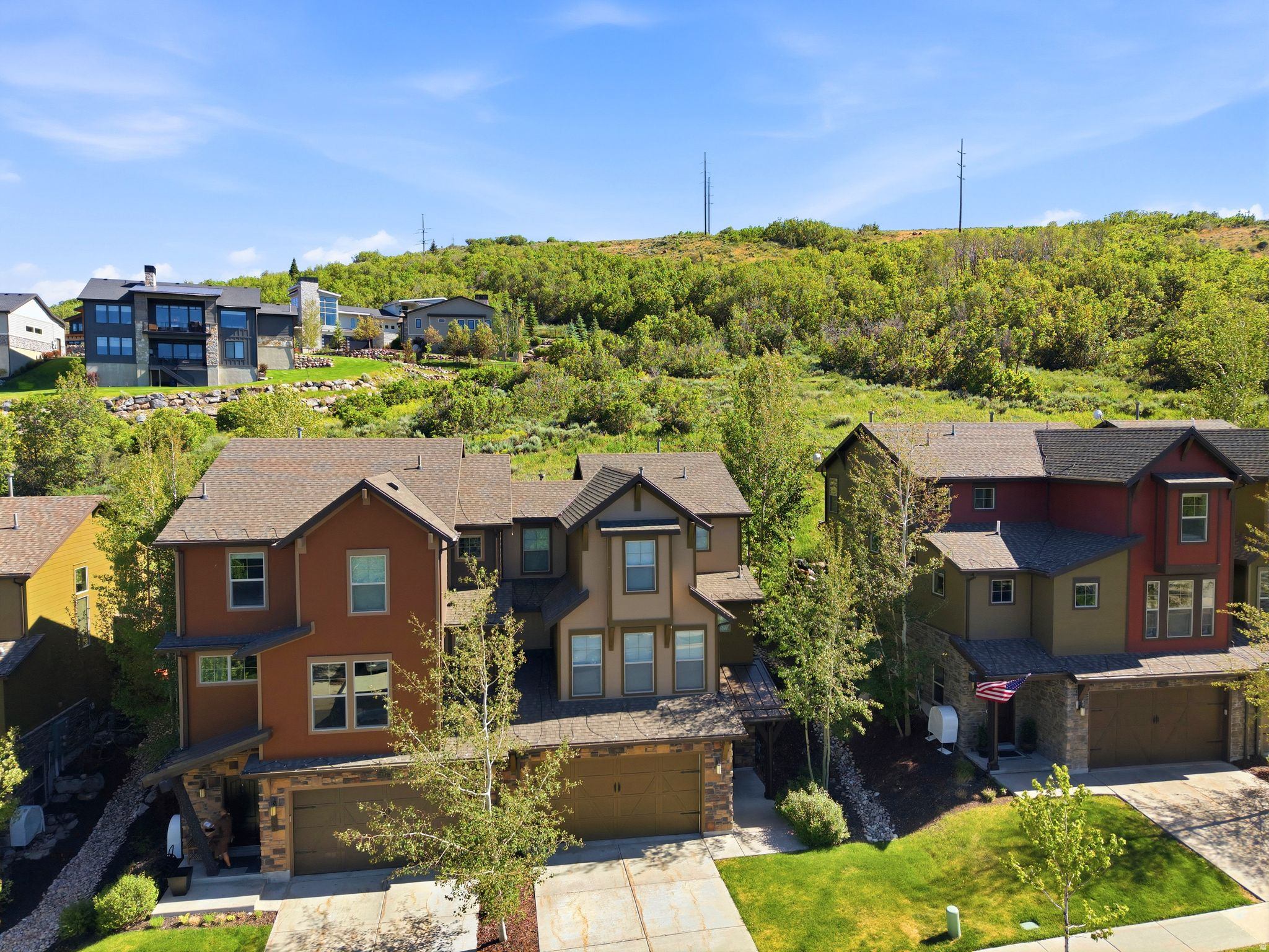 Welcome to the Retreat at Jordanelle where location is everything!  This unit offers privacy as it backs to open space and lies just 8 minutes to the NEW Deer Valley East Village and world-class skiing.  You'll enjoy trails and mountain biking out your door as well as hiking and boating at the Jordanelle!  This 4-bedroom, 3.5-bath home is filled with natural light and thoughtful upgrades, including vaulted ceilings, fireplace, updated lighting, modern stair railings, custom built-in garage storage, furnishings are negotiable.  Appliances include new washer/dryer, dishwasher and refrigerator in garage closet.  The main floor features an open layout connecting the living, dining, and kitchen areas. The oversized lower-level bedroom and en suite bath, offers an exceptionally comfortable bunk room for guests! BONUS FEATURE: private backyard and hot tub.  This unit is just 10 minutes to Park City old Town and is Nightly Rental Approved.   Property also offers fantastic amenities including a clubhouse, workout room, theater room, dog park area, seasonal pool, year-round hot tub, lawn maintenance, and snow removal.   Square footage figures are provided as a courtesy estimate only and were obtained from County Records. Buyer is advised to obtain an independent measurement.