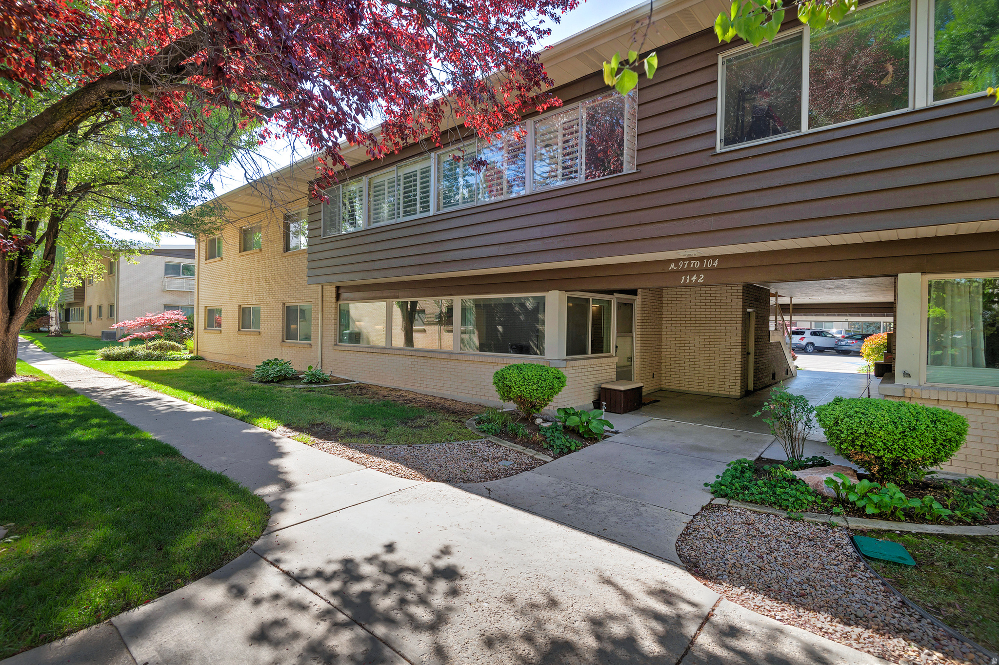 Welcome to this beautifully updated main-level condo in the highly sought-after Graystone community in Sugar House, Salt Lake City. This spacious 3-bedroom, 2-bathroom condo offers desirable single-level living with an open floor plan, abundant natural light, and modern finishes throughout. The bright and inviting living space features large windows, expansive living areas, and a semi-formal dining area, perfect for both everyday living and entertaining. The updated kitchen is a standout, showcasing quartz countertops, a custom tile backsplash, stainless steel appliances, and a kitchen island with bar seating. The primary suite includes a private en-suite bathroom and walk-in closet, while the versatile third bedroom is ideal for a home office, guest room, or creative space. Located in the heart of Sugar House-one of Salt Lake City's most desirable neighborhoods-the Graystone community offers maintenance-free living with amenities including a pool, clubhouse, landscaped grounds, and snow removal. Enjoy unbeatable proximity to Sugar House Park, Sugar House Shopping Center, dining, shopping, entertainment, and outdoor recreation-all just minutes away. Additional highlights include covered parking, main-floor access, and low-maintenance living. If you're looking for a move-in-ready condo in Sugar House with modern updates and a prime location, this is it.