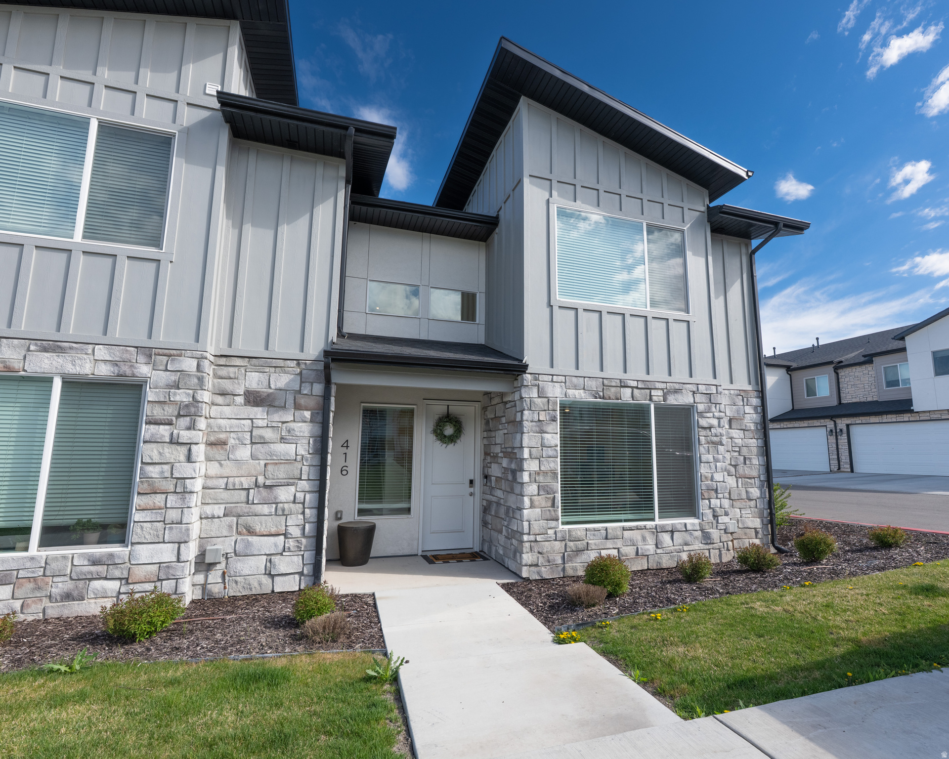This beautiful townhome is located in the Providence Gateway community. This community is highly desirable due to it's abundance of outdoor activites including pickleball courts, a playground, clubhouse, gym, and pool! As an added bonus, directly in front of the home offers a spacious grass field perfect for extra outdoor space to enjoy. Experience plenty of outdoor fun without the maintance upkeep! The townhome itself is a sought-after end unit offering a spacious floor plan with a generous amount of natural light throughout - also including a versitile loft area to fit your needs. Don't miss out on this amazing opportunity in a prime location! Square footage figures are provided as a courtesy estimate only. Buyer is advised to obtain an independent measurement.
