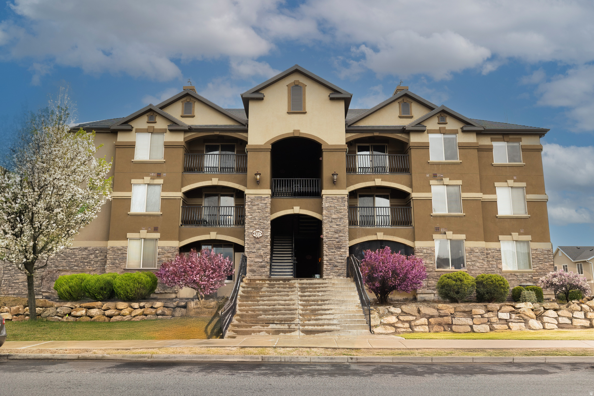 Welcome to this beautifully maintained top-floor condo in Pleasant Grove, featuring vaulted ceilings, an open floor plan filled with natural light, and stunning mountain views. Relax on the private covered balcony or enjoy cooking in the spacious kitchen with granite countertops and included stainless steel appliances. Recent updates include newer carpet and paint throughout and a newer water softener. Plenty of storage with two dedicated storage rooms, one on the balcony and one in the garage, as well as two assigned parking spaces in the secure underground parking garage. The HOA includes internet, water, sewer, trash, landscaping, snow removal, and common area maintenance, making for easy, low-maintenance living. Residents also enjoy exceptional amenities including a pool, hot tub, clubhouse with a full kitchen and theater room, fitness center, sport court, basketball court, and two playgrounds. Conveniently located just off I-15 and within walking distance of dozens of restaurants, shopping, and everyday conveniences. Fantastic investment opportunity. Currently rented month to month for $1,850 per month. Tenant pays utilities. Come see it today!