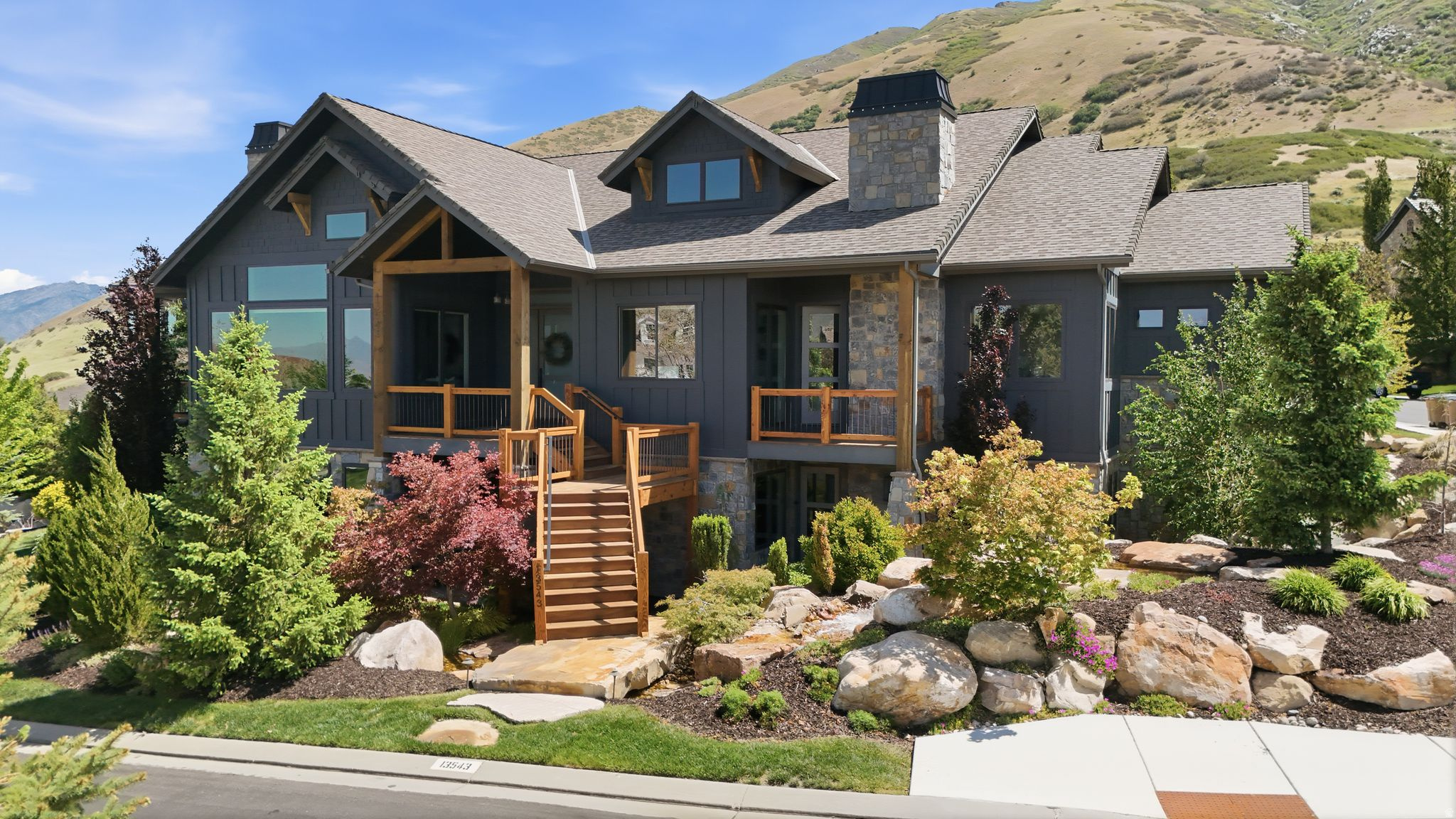 A former Steeplechase Parade Home, fully renovated in 2019, perched to capture uninterrupted mountain and valley views from nearly every room. Behind the glass filled great room, with soaring ceilings and a dramatic wall of windows, sits a true gourmet kitchen with a large island, custom cabinetry, [double ovens, gas range, brand name appliances], and stone countertops, built for everyday living and large gatherings alike. The owner suite is a retreat of its own: oversized windows framing the view, a fireplace, and a spa inspired bath with dual vanities, a soaking tub, an oversized shower, and a large walk in closet. The lower level is built for entertaining, with a second full kitchen, a family room, a dedicated theatre, and a private gym. Step out to a covered patio with an outdoor fireplace and full outdoor kitchen, where the same sweeping views become the backdrop for every evening. 5 bedrooms, 5 baths, 6,280 sq ft, 3 car garage, 0.44 acre lot, built 2016 and renovated 2019. Located in one of the newer phases of one of Draper most sought after communities, within minutes of hiking trails, golf course, shopping, restaurants and freeway access. Schedule your private showing today. Homes of this caliber and view in Steeplechase rarely come available.