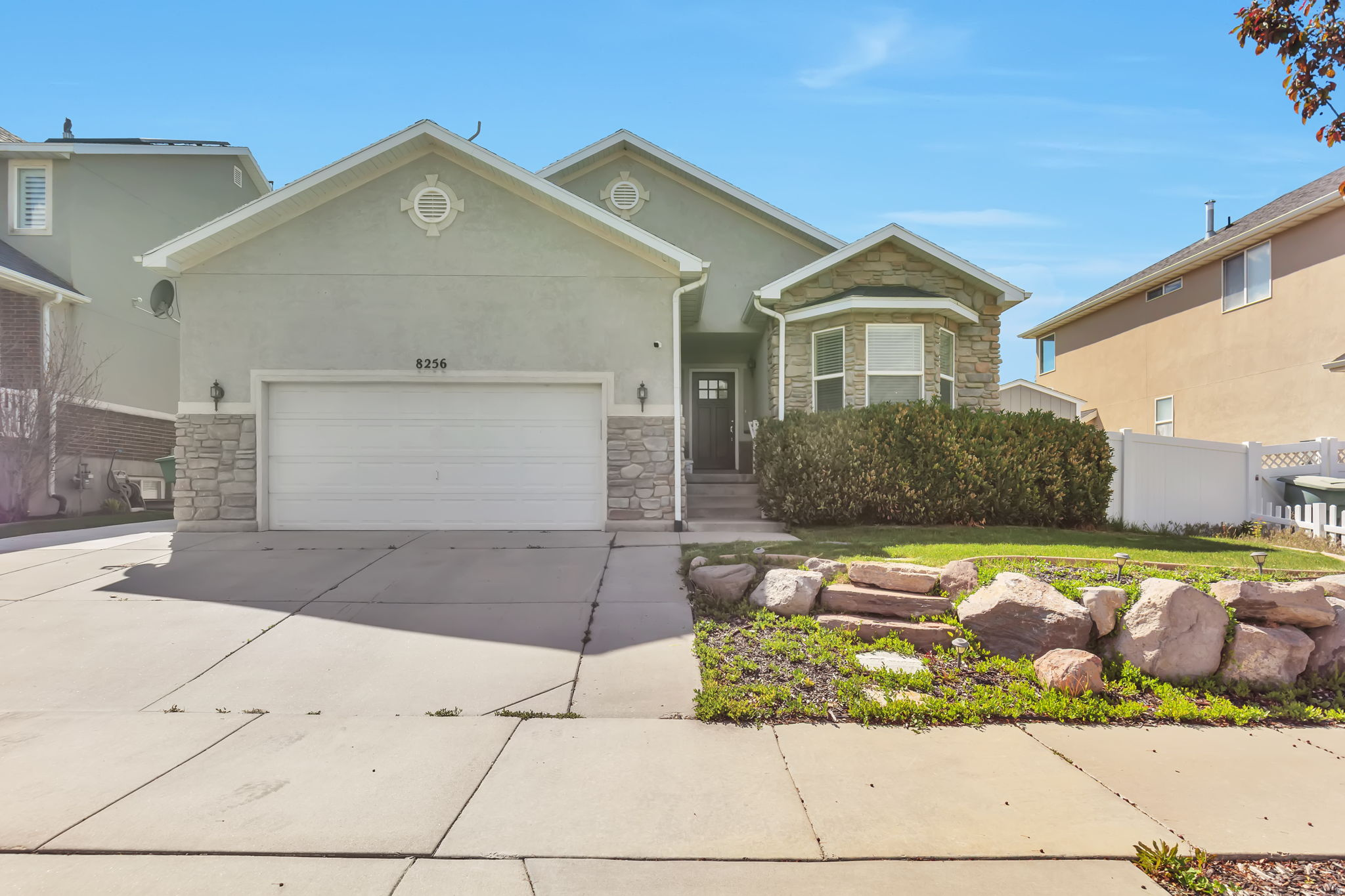 Welcome to this beautiful rambler, offering comfort, flexibility, and incredible value. The home includes a fully finished basement apartment with its own private entrance, kitchen, and laundry - easily rented for around $1,650/month, making it a fantastic option to offset your mortgage or provide space for extended family. The spacious master suite features a large walk in closet, and the open concept living room and kitchen create an inviting space for everyday living and entertaining. Step outside to a backyard designed for fun and relaxation. You'll love the pergola, in pit, and raised garden beds - all set within a wonderful neighborhood just minutes from schools, shopping, and quick access to the Mountain View Corridor. Seller is willing to include yard equipment, snowblower, and more.