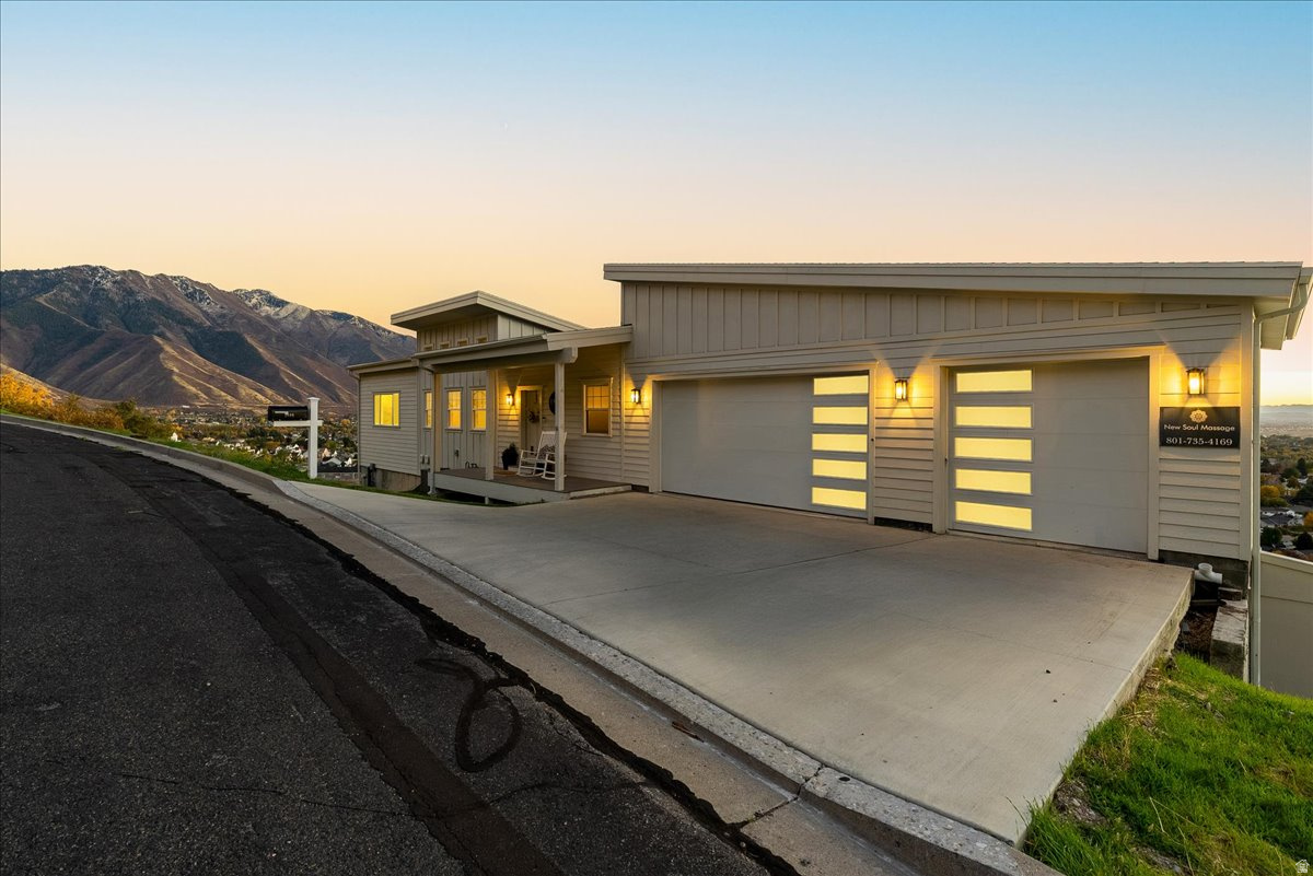 The views alone take your breathe away!! This house is unlike any other home in the neighborhood. Impeccably built to last, maintained with heart! Views! Views! Views!! You have the chance to own the home of your dreams. Beautiful floorplan, lots of natural light and unobstructed views from each window. The whole house is wired with an audio system, even the lower deck hot tub is wired for audio. Great yard with mature, native, mountainside landscaping. Never run out of water in your steam gen shower in the master suite, with a continuous 3,000 btu hot water heater. Then go out to the private porch off the master bedroom that is piped for gas. Down on the back porch it is wired for infared. Sun touch heated floors, 3 zone heating system, this house will keep you warm in the winter and cool in the summer with extra insulation. Do not miss your opportunity to live on top of the world!