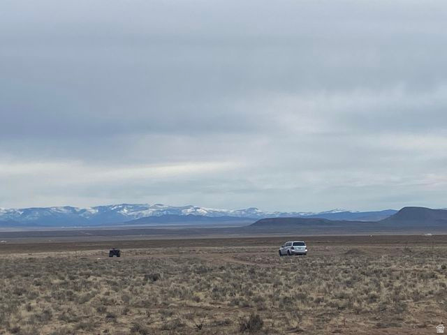 This might be the best piece of land in the Beryl/Lund area! Flat, grassy land with 1 Acre Foot of water (1945 Priority Date, #71-5760) and access via a deeded easement from the BLM. A dirt road has been cut in, making access with vehicles or a trailer very easy! Surrounded on 3 sides by either BLM or state land with 360 degree views! It is part of the SouthWest Desert Trophy Elk Unit. The property has a fence running down the west boundary and rough boundary corners are staked. Soils analysis provided in document section.