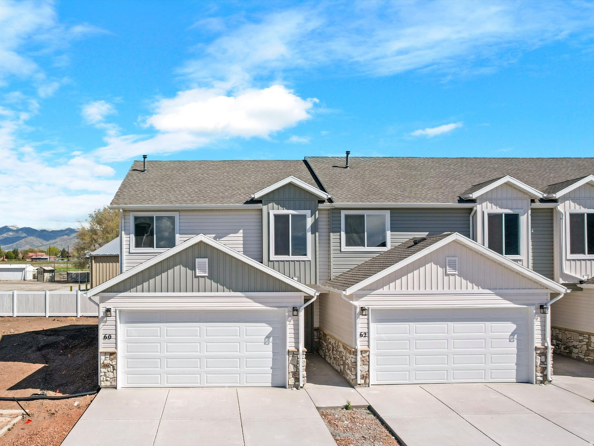 BUILDER IS OFFERING A 2.99% NEW CONSTRUCTION RATE! GET YOUR PAYMENT AS LOW AS 1400 A MONTH USING BUILDERS PREFERED LENDER. Contact listing agent or lender for full details and qualifications. 3 Bedrooms | 3 Bathrooms | Attached Garage Experience the luxury of being the very first to live in this stunning, new construction townhome in the heart of Malad City. Currently under construction with a projected completion date of late April, this home offers the perfect opportunity to secure a modern residence just in time for the spring season. Modern Interior & High-End Finishes Gourmet Kitchen: The heart of the home features sleek quartz countertops, custom cabinetry, and a layout designed for both functionality and style. Spacious Living: With 3 well-appointed bedrooms and 3 bathrooms, the floor plan maximizes space and natural light, providing a fresh, contemporary feel. New Everything: From the energy-efficient HVAC system to the brand-new appliances and flooring, enjoy the peace of mind that comes with a full builder warranty and zero "fixer-upper" projects. Exterior & Location Attached Garage: Stay out of the Idaho elements with a private, attached garage that offers extra room for storage or recreational gear. Prime Malad Location: Situated with easy access to I-15, you are perfectly positioned for a quick commute to Logan or Pocatello, while being just minutes away from the outdoor recreation Malad is known for. Low Maintenance: The townhome lifestyle offers the benefit of a newer property with less exterior upkeep, allowing you more time to enjoy the surrounding mountain views and local amenities. Don't wait-new construction in Malad City moves quickly. Contact us today for a construction progress tour and to see the finish samples!