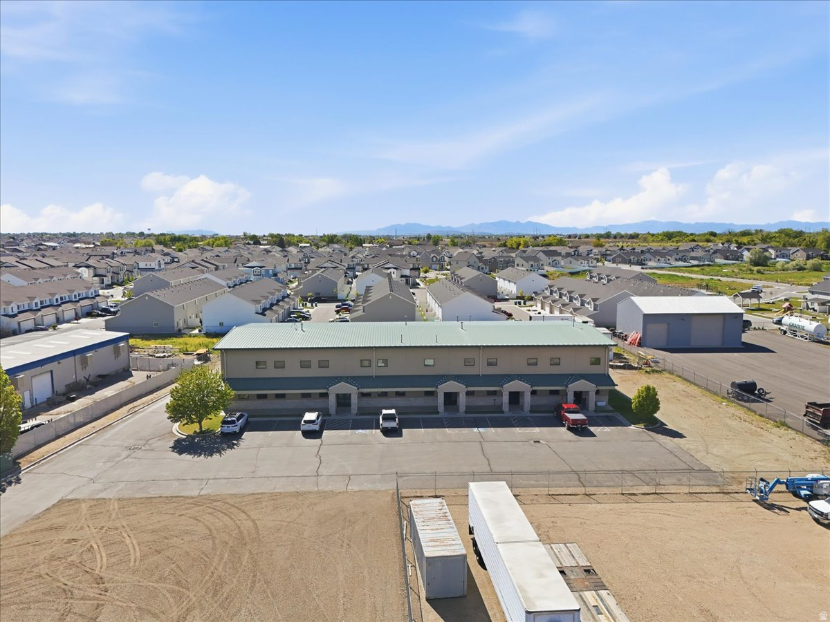 Located in a prime West Haven industrial area with convenient access to major roadways and interstates, this 12,305 SF property offers exceptional functionality and strong long-term investment potential. Currently leased to a single tenant under an existing lease, the property provides immediate and stable cash flow. The current configuration includes 2,804 SF of office space, 5,896 SF of warehouse space, and a 3,605 SF mezzanine. The building features four overhead doors, 3-phase power, and a fully fenced, secure yard. Designed for flexibility, the property can be divided into up to four separate units, creating future multi-tenant opportunities and enhanced investment versatility.